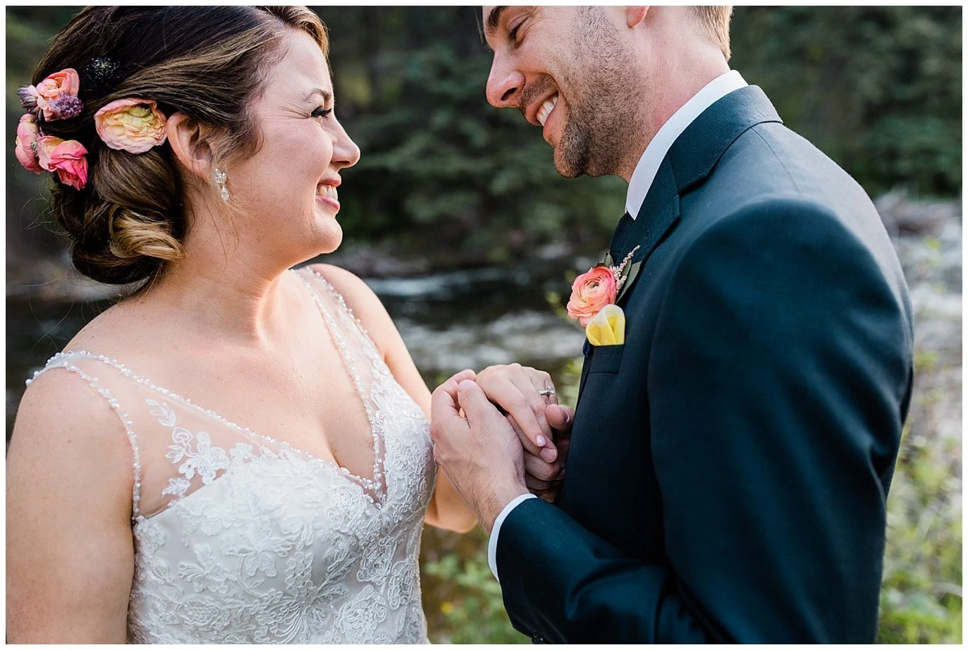 Bride and groom laughing at Sonnenalp Hotel Vail Colorado Wedding by Colorado Wedding Photographer Jennie Crate