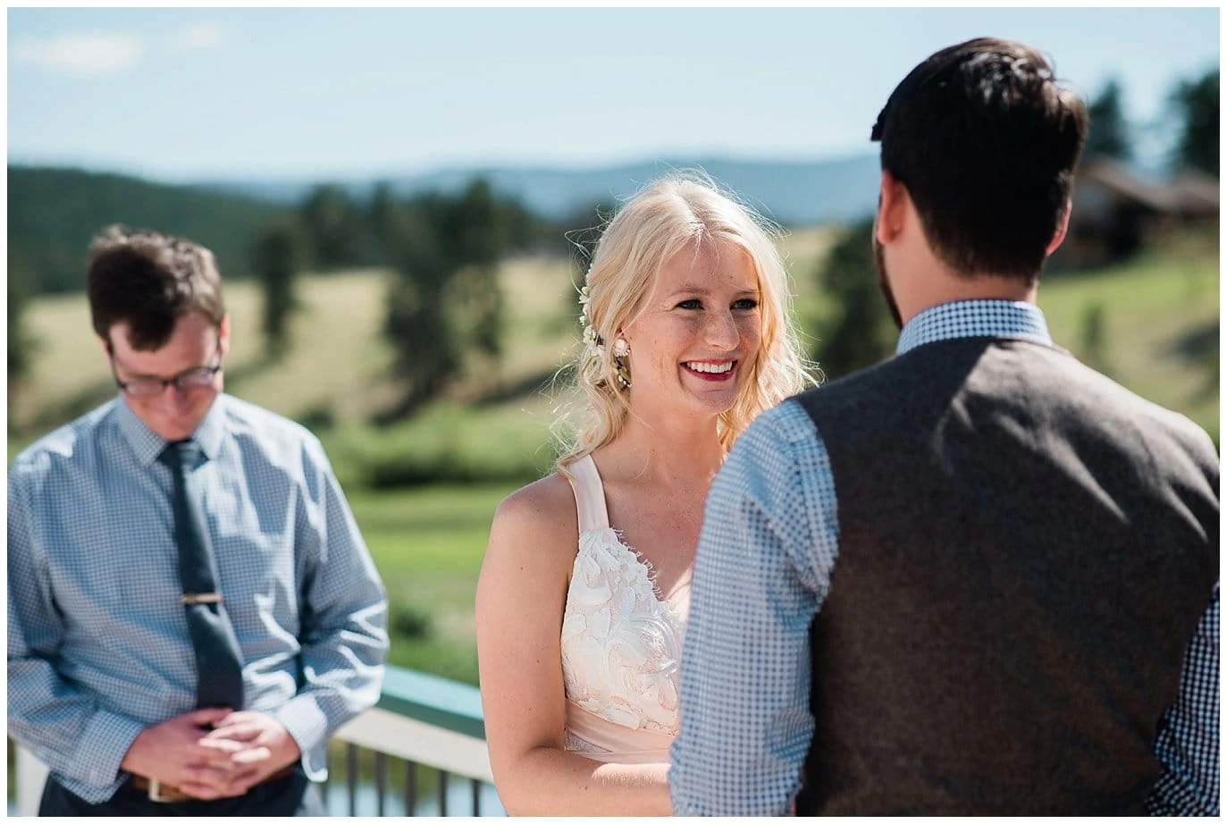 bride and groom say vows on Gazebo at Deer Creek Valley Ranch wedding by Conifer Wedding Photographer Jennie Crate Photographer
