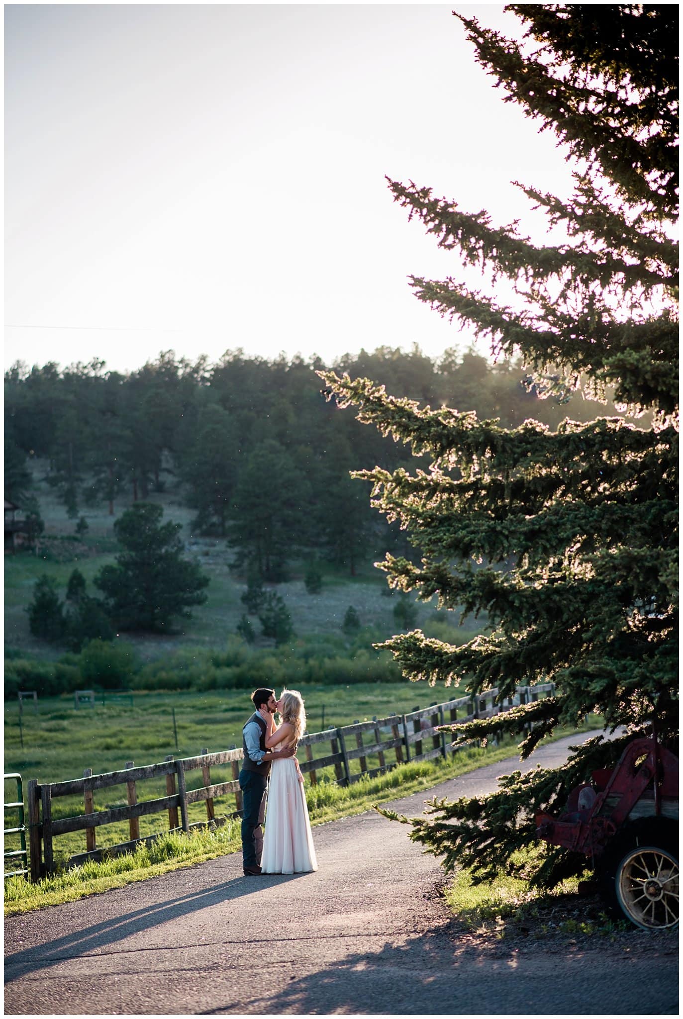 bride and groom sunset photo at Deer Creek Valley Ranch wedding by Colorado Wedding Photographer Jennie Crate Photographer