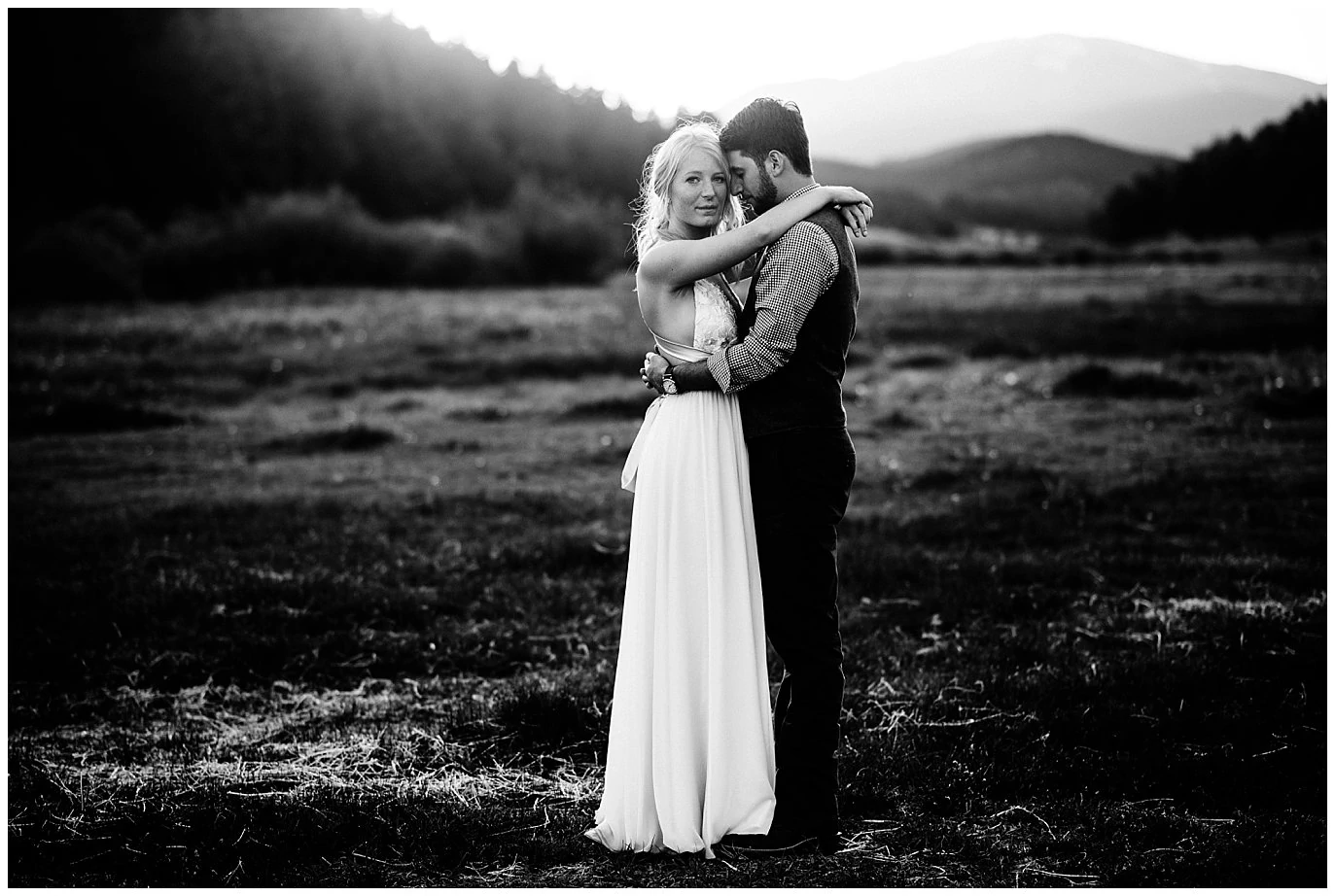 dramatic black and white bride and groom portrait at sunset at Deer Creek Valley Ranch wedding by Colorado Wedding Photographer Jennie Crate Photographer