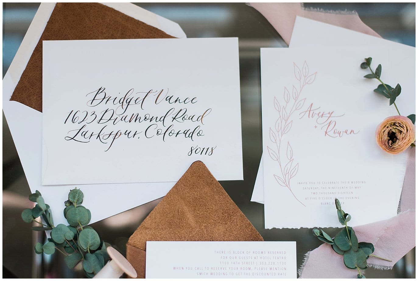 hand calligraphy leather invite at summer blanc wedding by Boulder wedding photographer Jennie Crate photographer