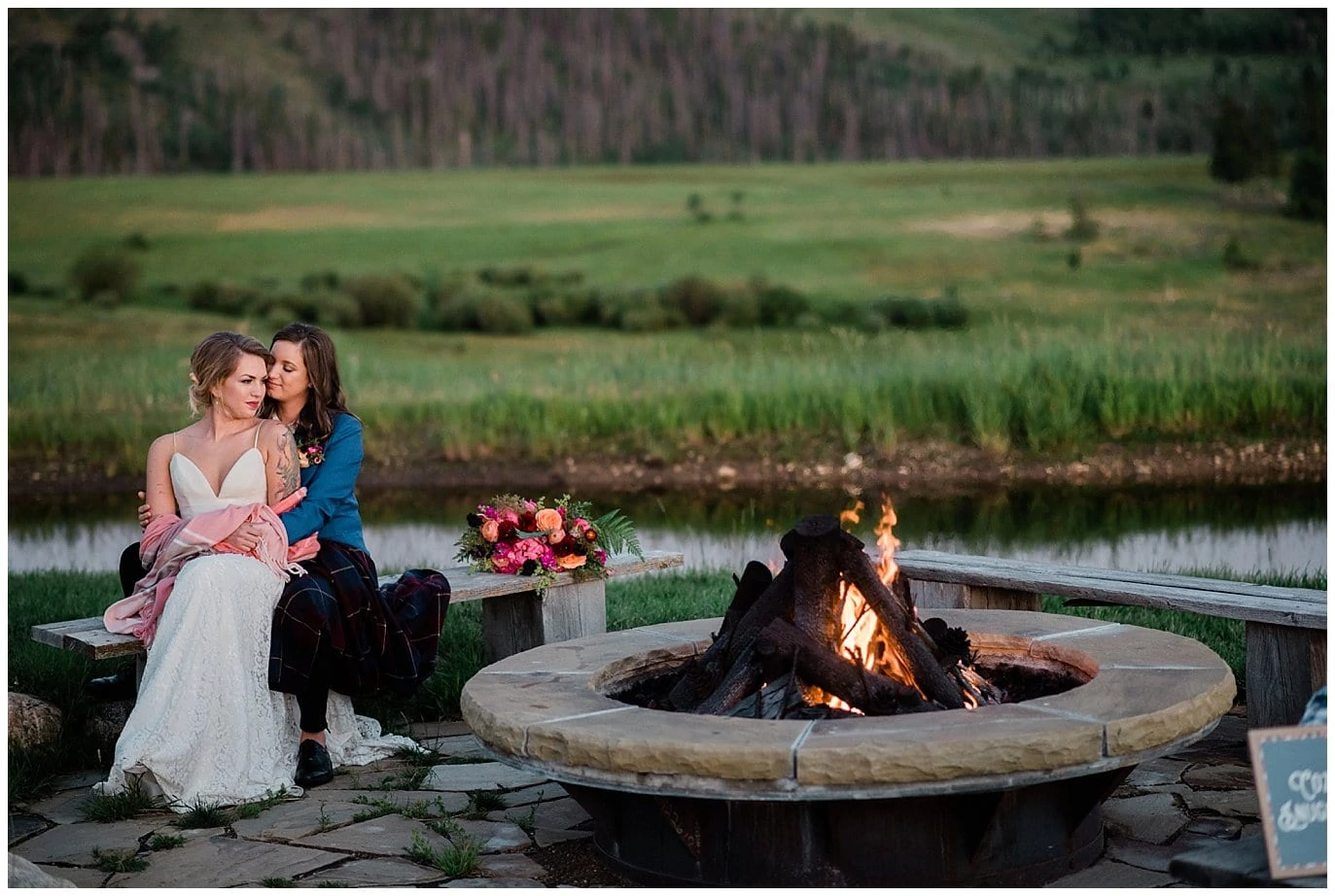 couple by fire pit at Intimate Strawberry Creek Wedding by Denver Wedding Photographer Jennie Crate Photographer