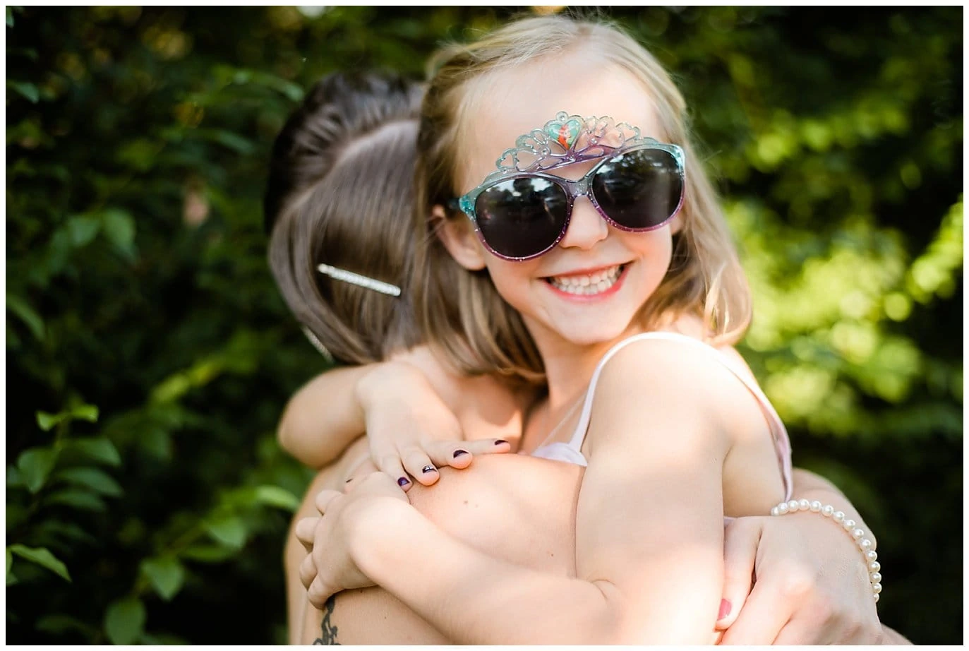 flower girl with princess sunglasses photo