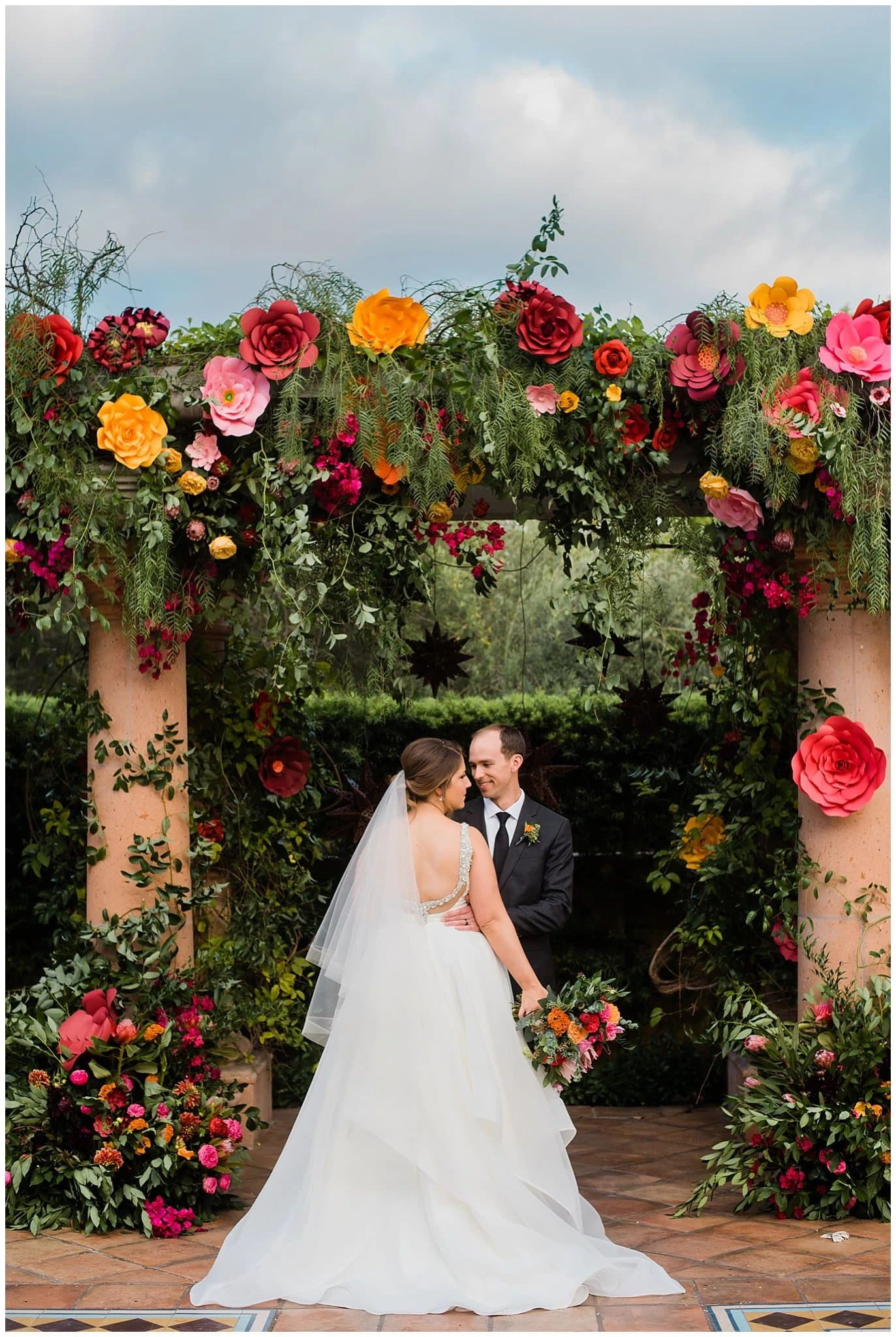 colorful paper flower wedding alter photo