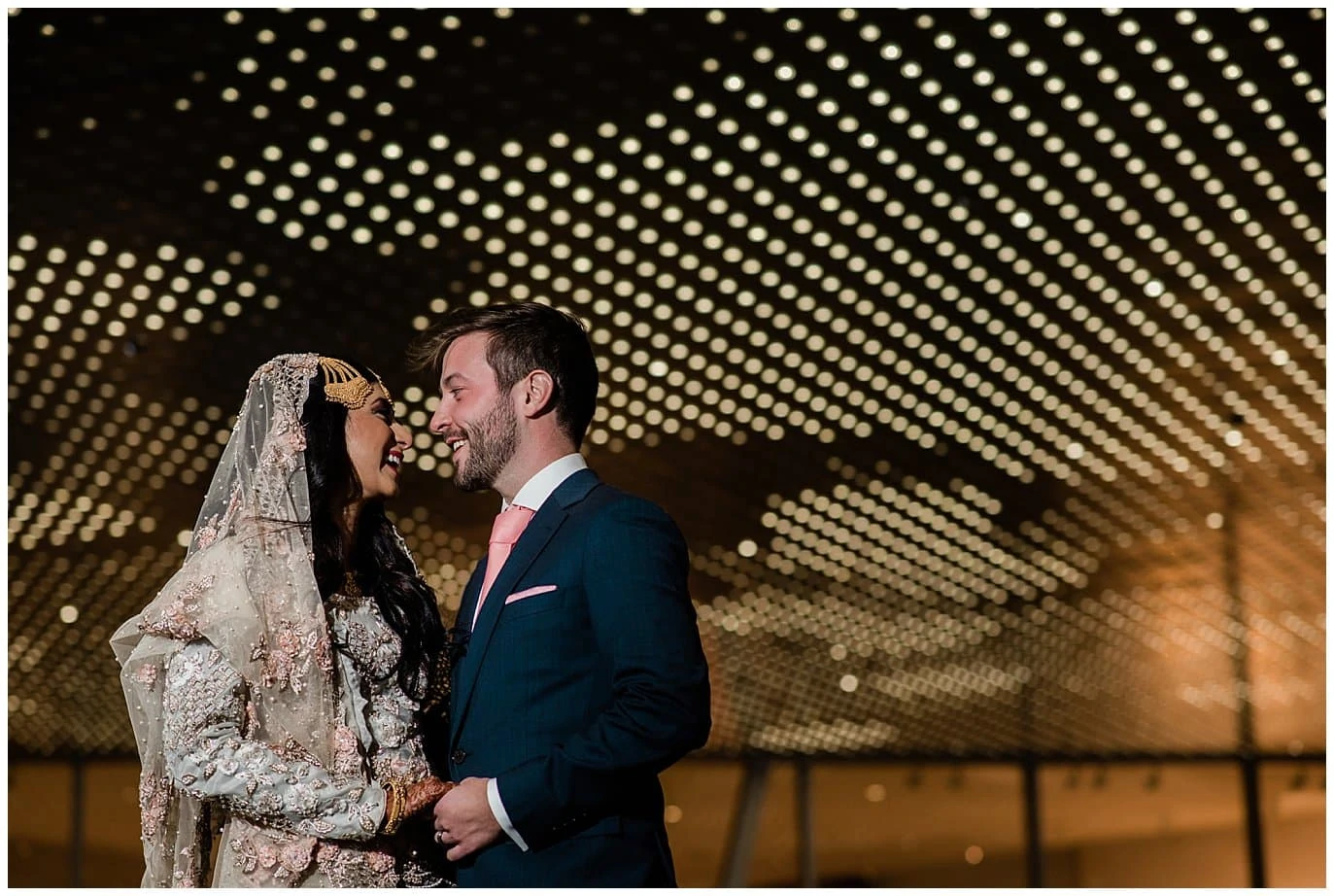 The Art Hotel wedding photo under lights photo