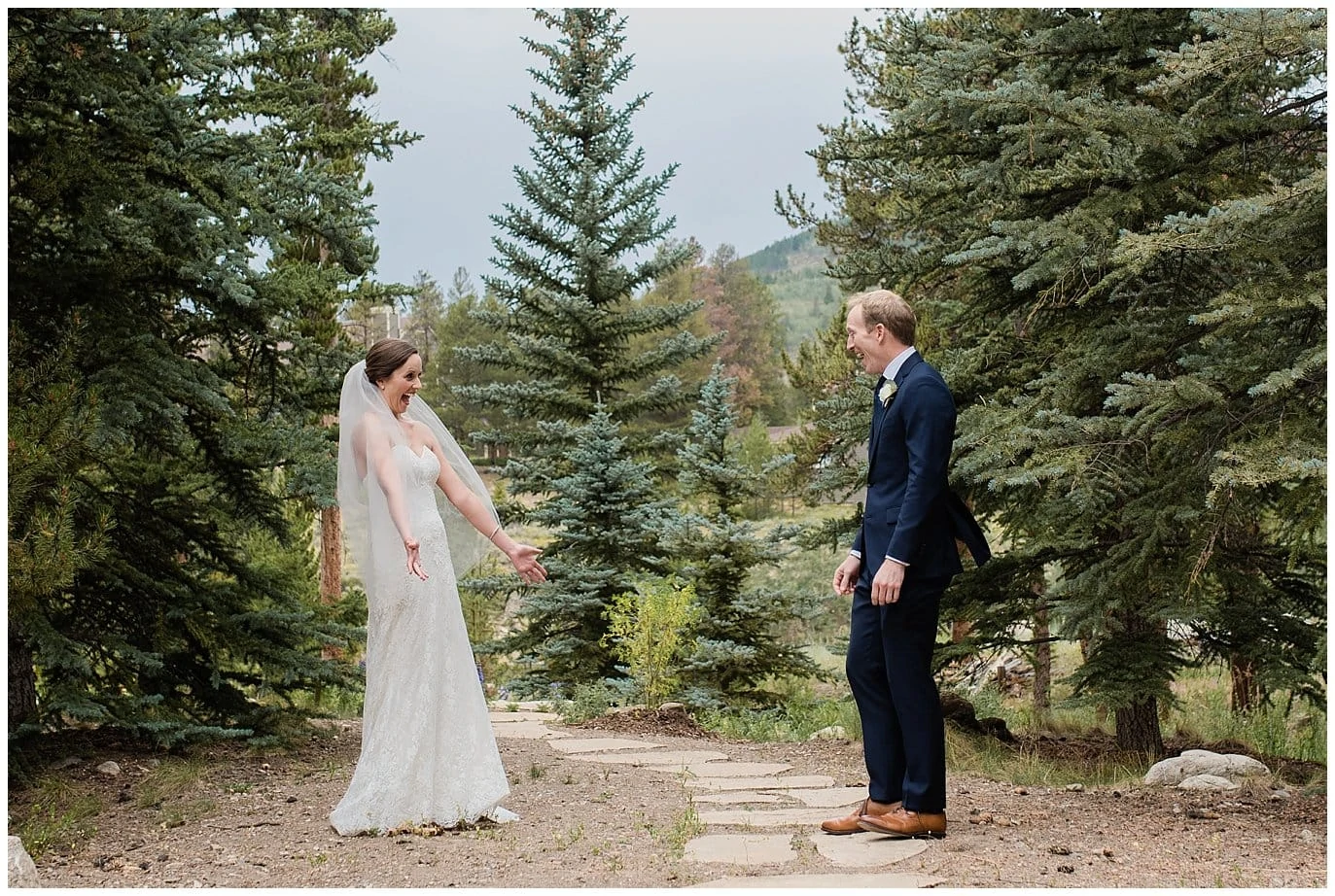 excited first look between bride and groom at Arapahoe Basin Black Mountain Lodge Wedding by Breckenridge Wedding Photographer Jennie Crate