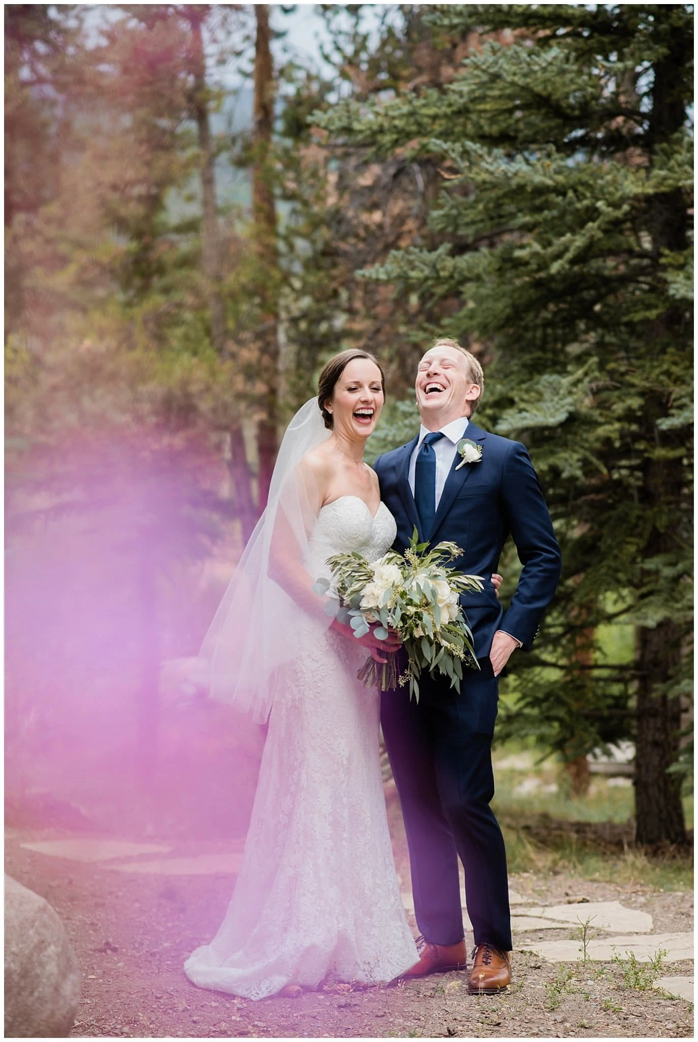 laughing bride and groom at Arapahoe Basin Black Mountain Lodge Wedding by Colorado Wedding Photographer Jennie Crate