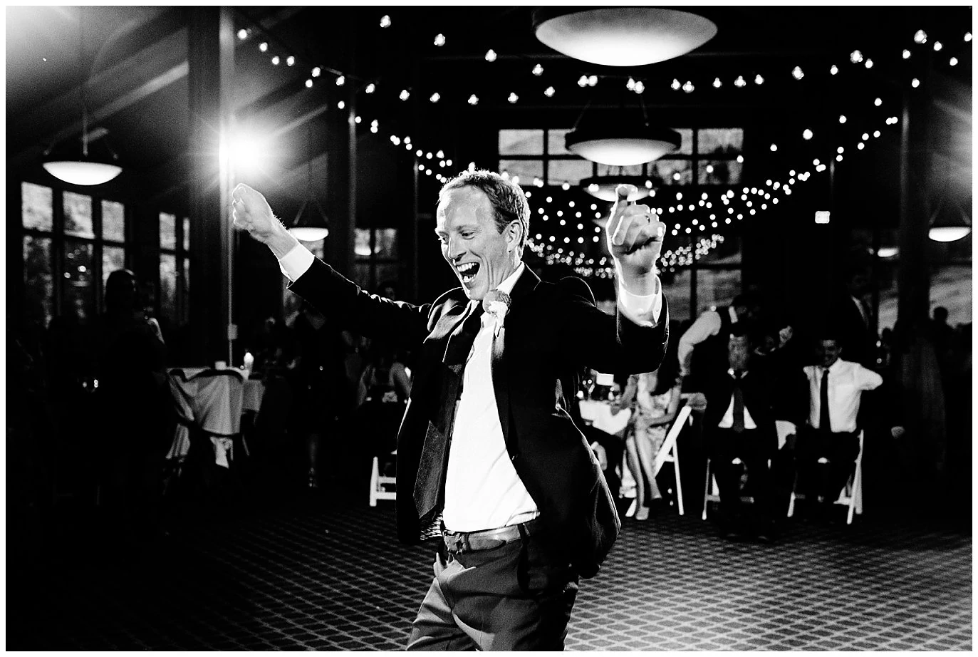 groom dancing at Black Mountain Lodge reception in Colorado photo