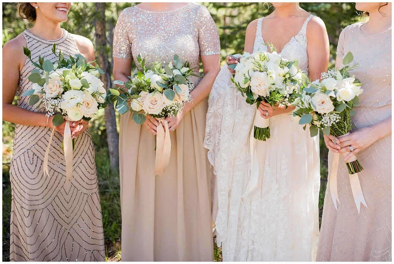 neutral elegant wedding flowers and champagne bridesmaids dresses at Summer Piney River Ranch wedding by Vail wedding photographer Jennie Crate, Photographer
