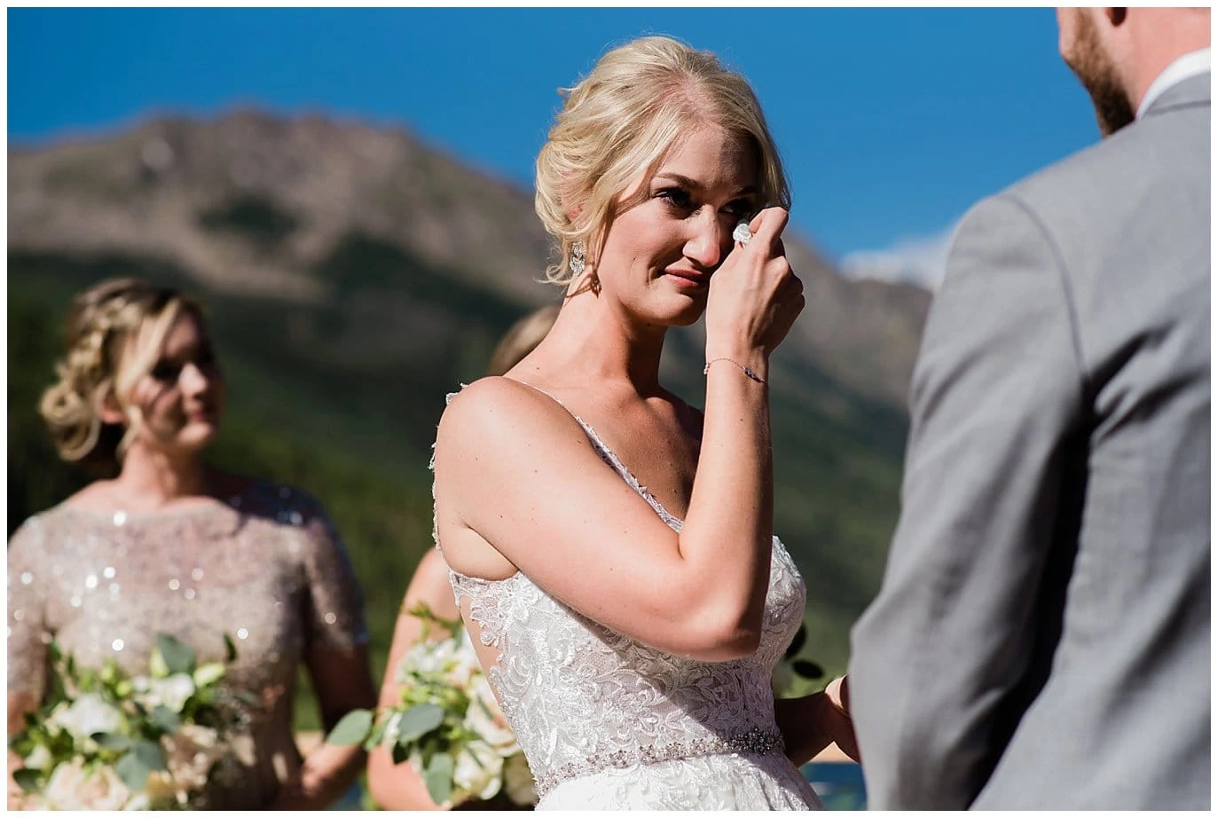 emotional bride during vows at Piney River Ranch wedding by Beaver Creek wedding photographer Jennie Crate, Photographer