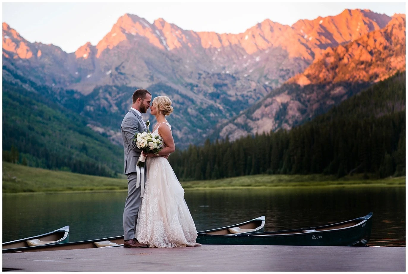 alpenglow sunset portraits on dock at Piney River Ranch wedding by Vail wedding photographer Jennie Crate, Photographer