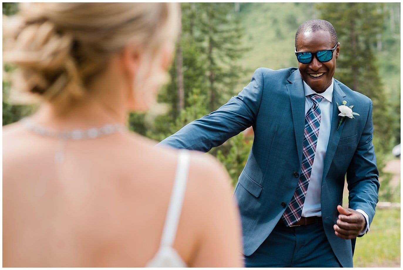 dancing groomsmen in sunglasses photo at Piney River Ranch wedding by Vail wedding photographer Jennie Crate photographer