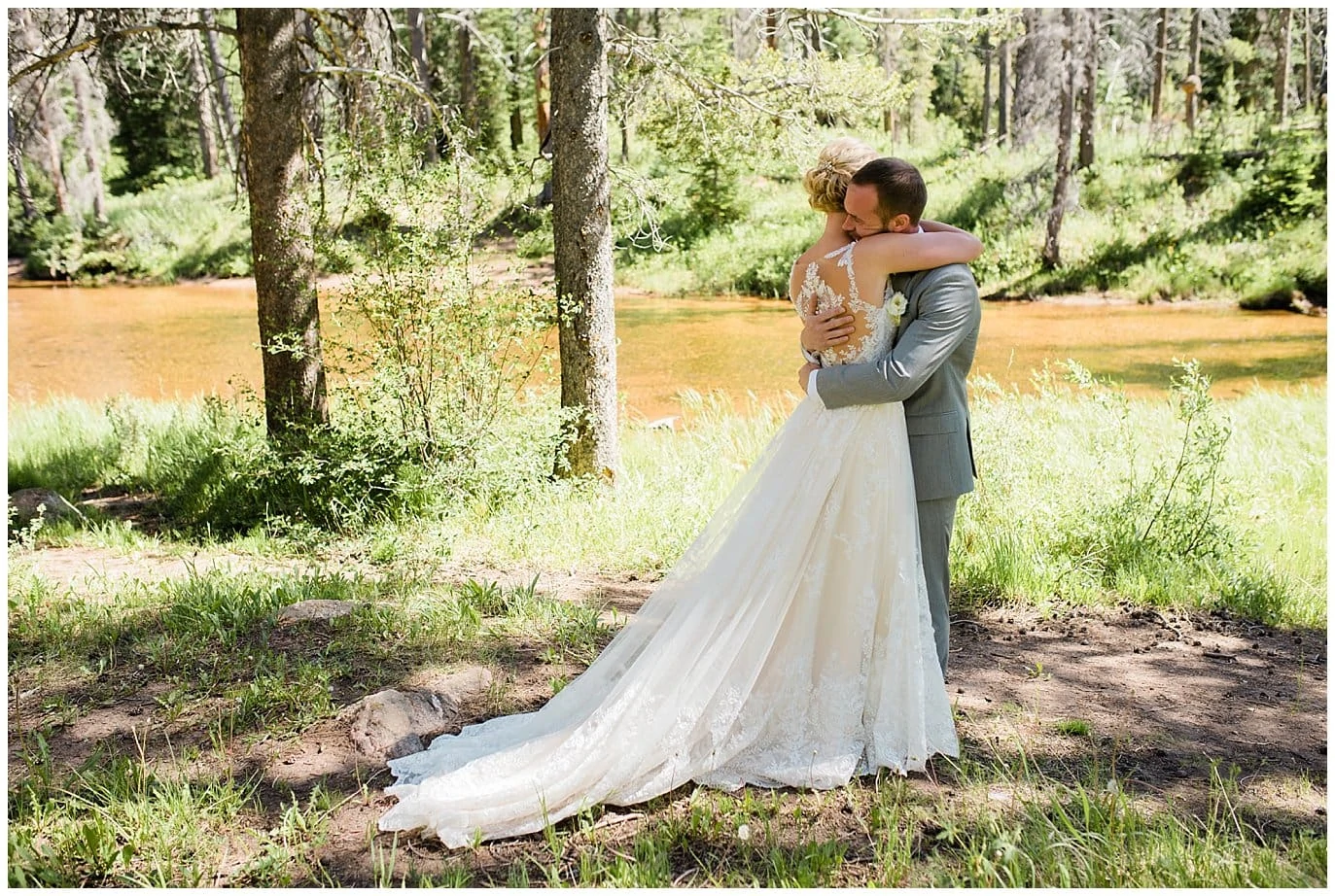 First look by river at Summer Piney River Ranch wedding by Vail wedding photographer Jennie Crate, Photographer