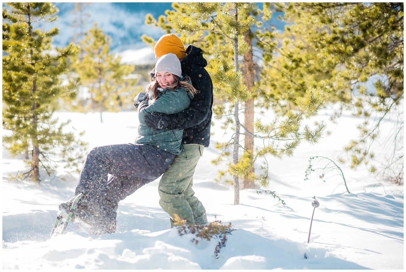fun in the snow at colorado winter engagement session photo