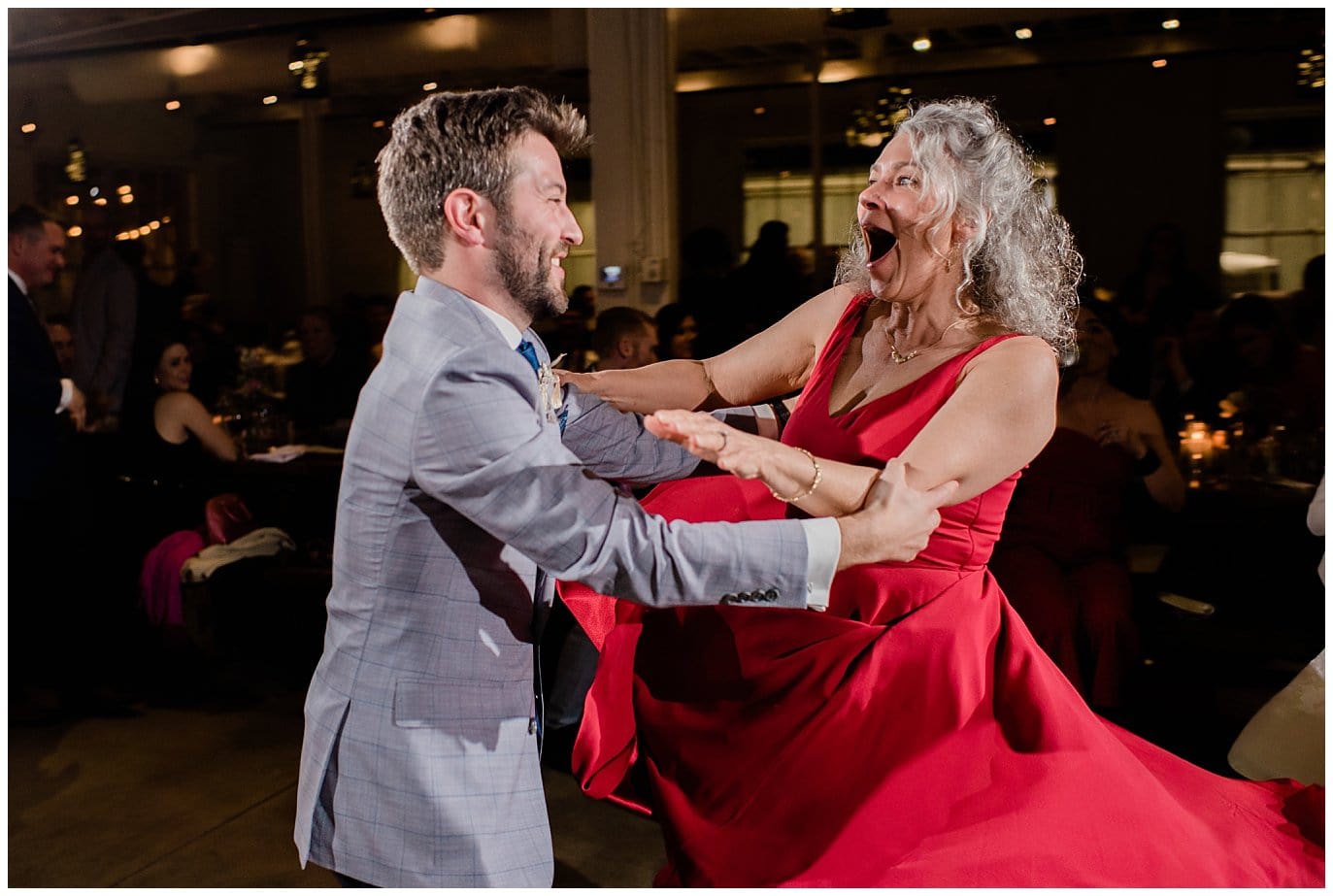 groom dancing at Denver wedding reception by blanc wedding photographer Jennie Crate