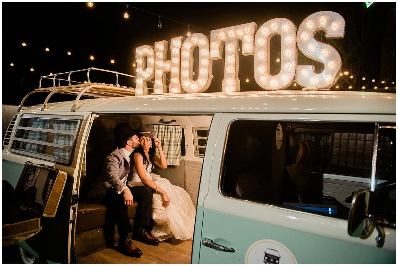 wedding couple in photo booth bus by Blanc Wedding Photographer Jennie Crate