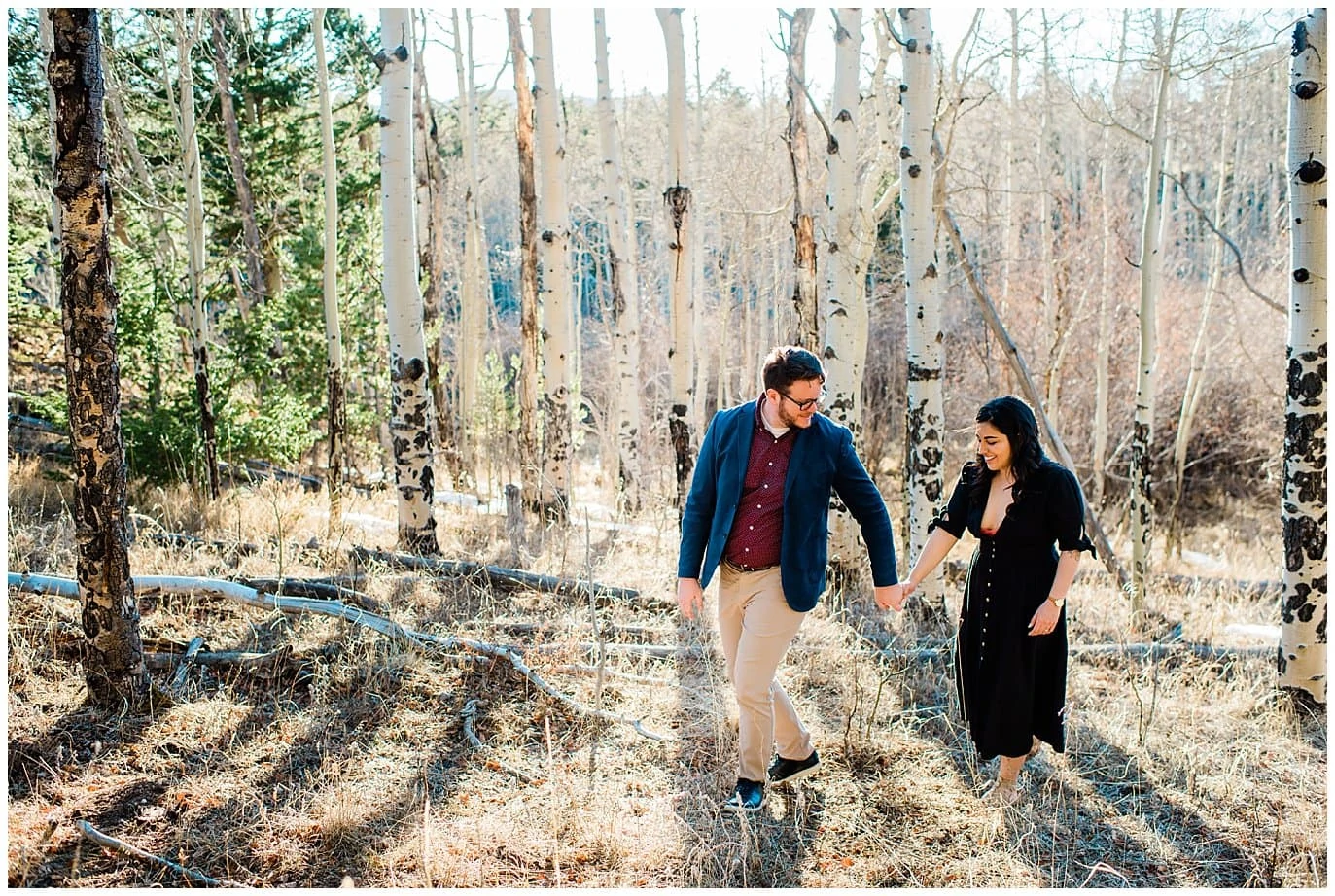 engagement photo in the aspen trees at Golden Gate Canyon park by Golden Engagement photographer Jennie Crate