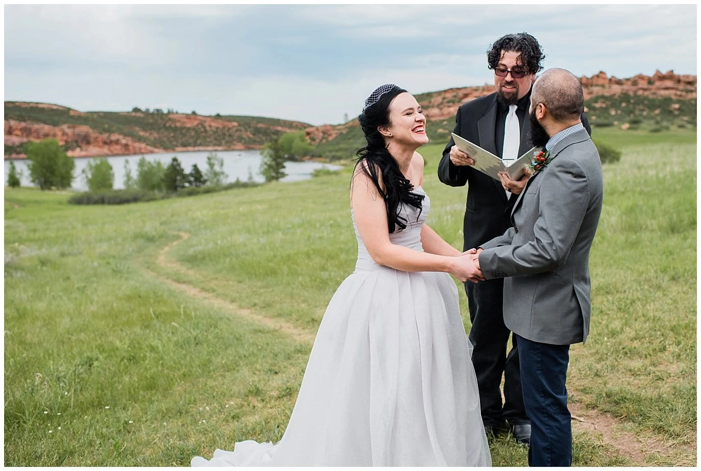 bride laughing at outdoor weding photo