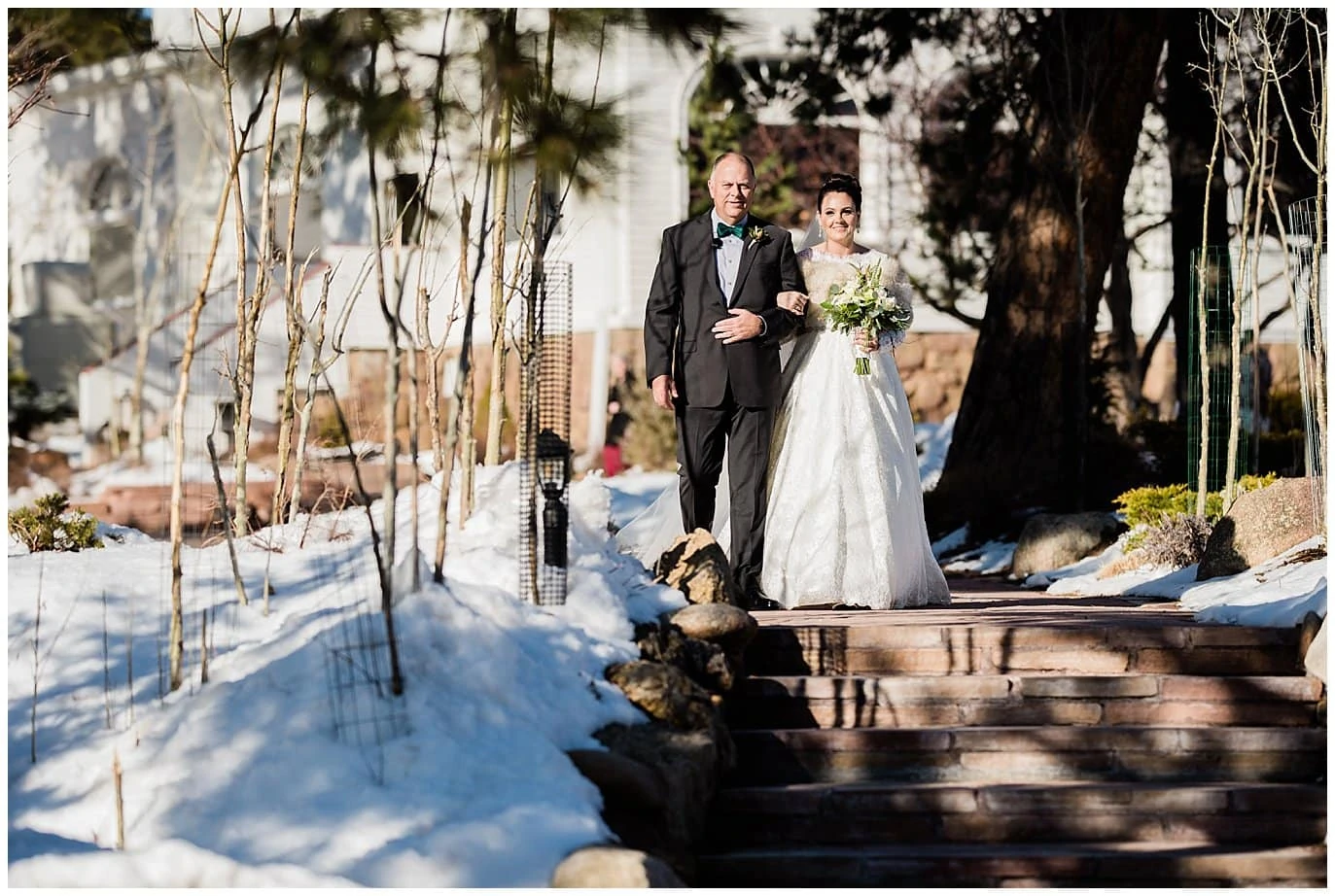 Bride and father walking to outdoor wedding at the Stanley Hotel photo