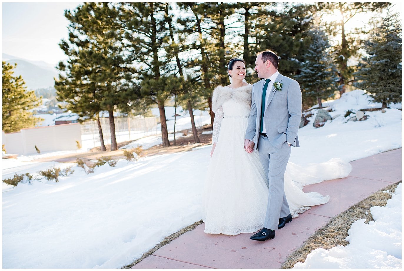Bride and Groom in snow at The Stanley Hotel photo