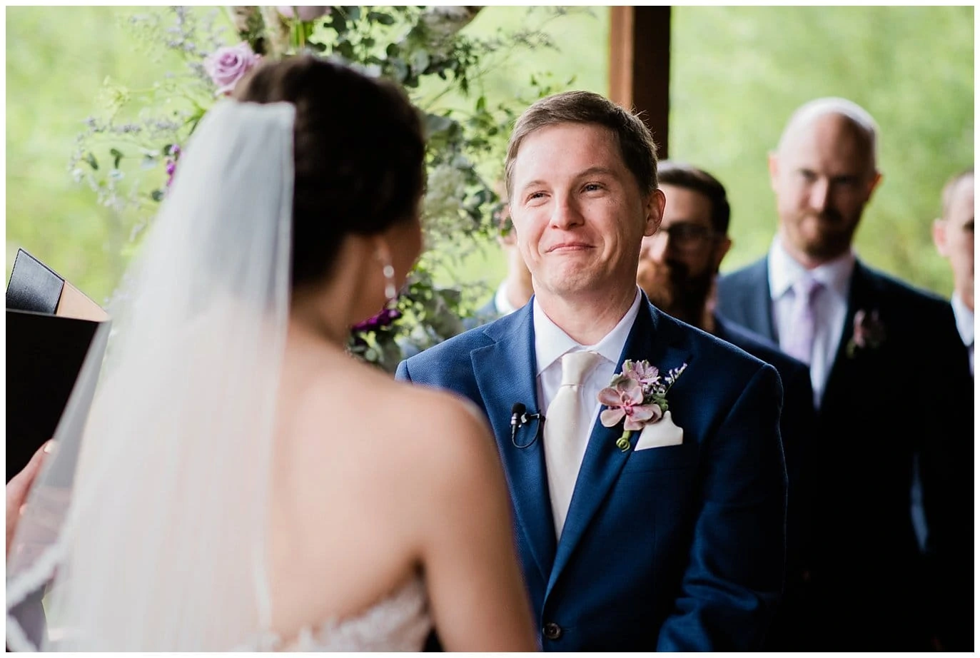 groom smiling at bride Colorado wedding photo