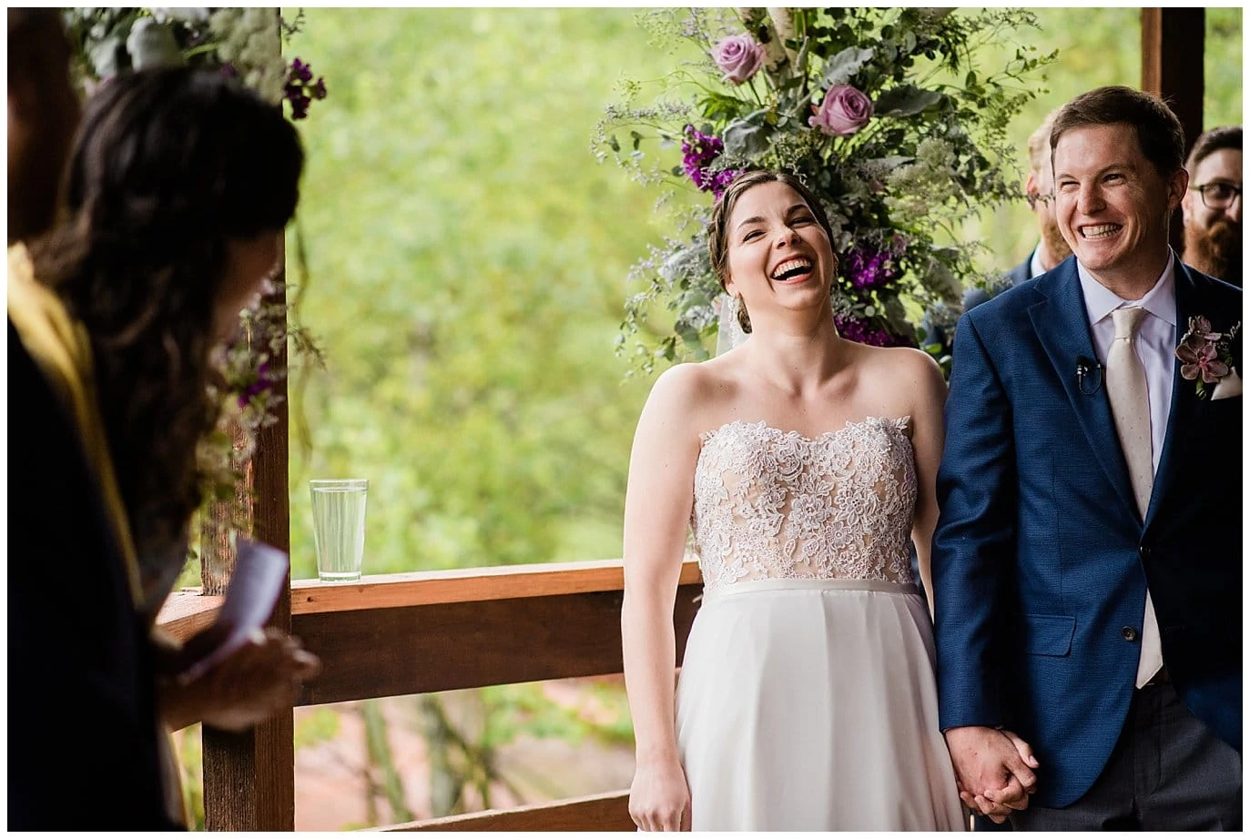 bride and groom laughing during wedding song photo