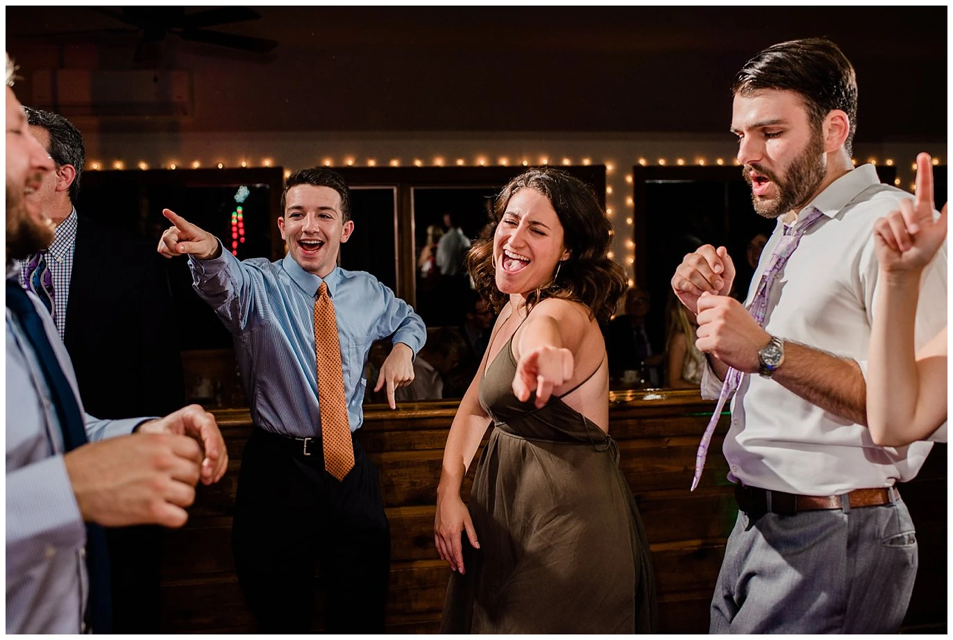 guests dancing at wedding reception photo