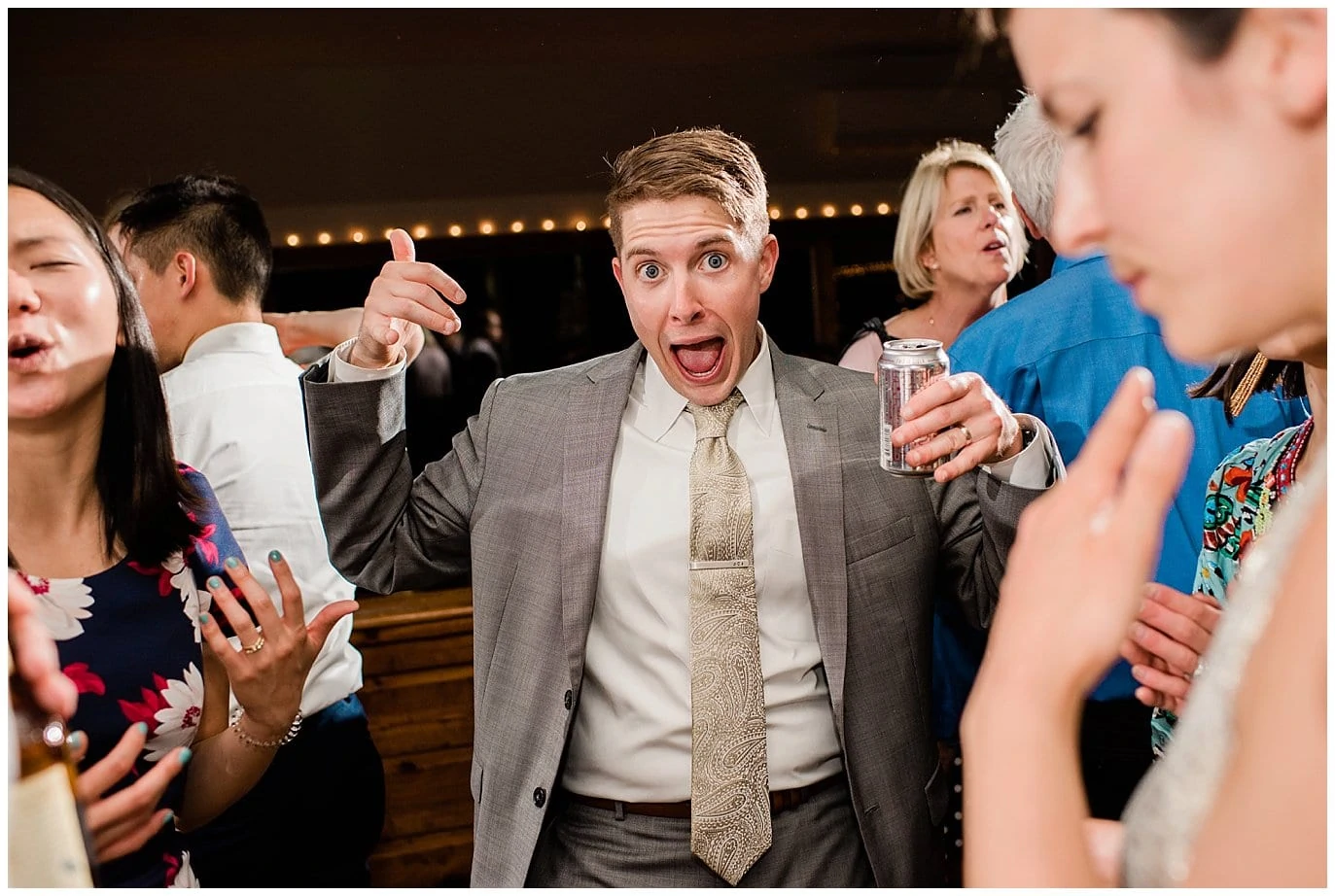 fun guests dancing at wedding photo