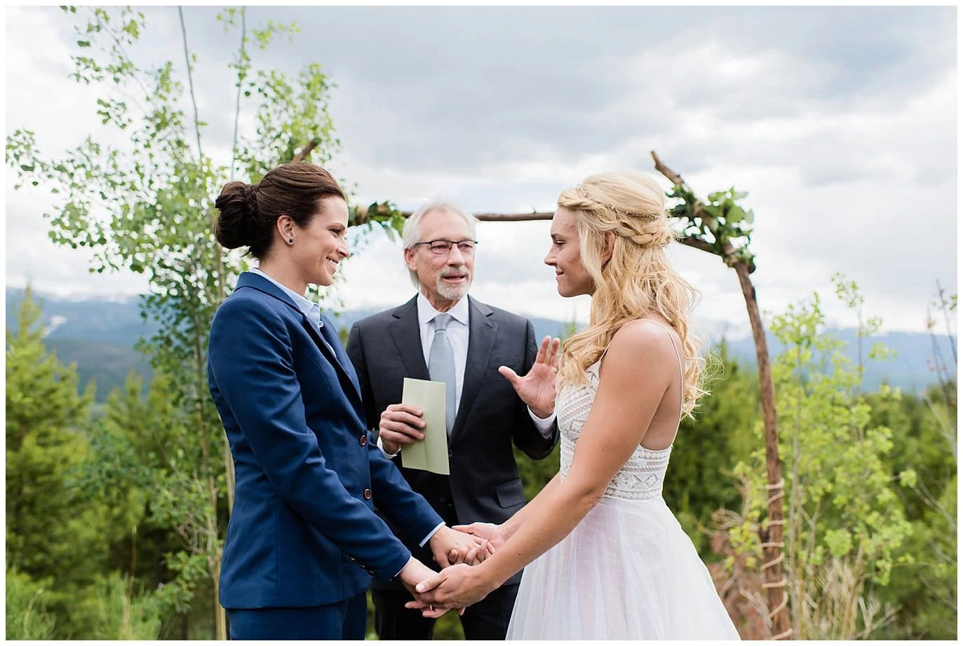 same-sex mountain wedding ceremony photo