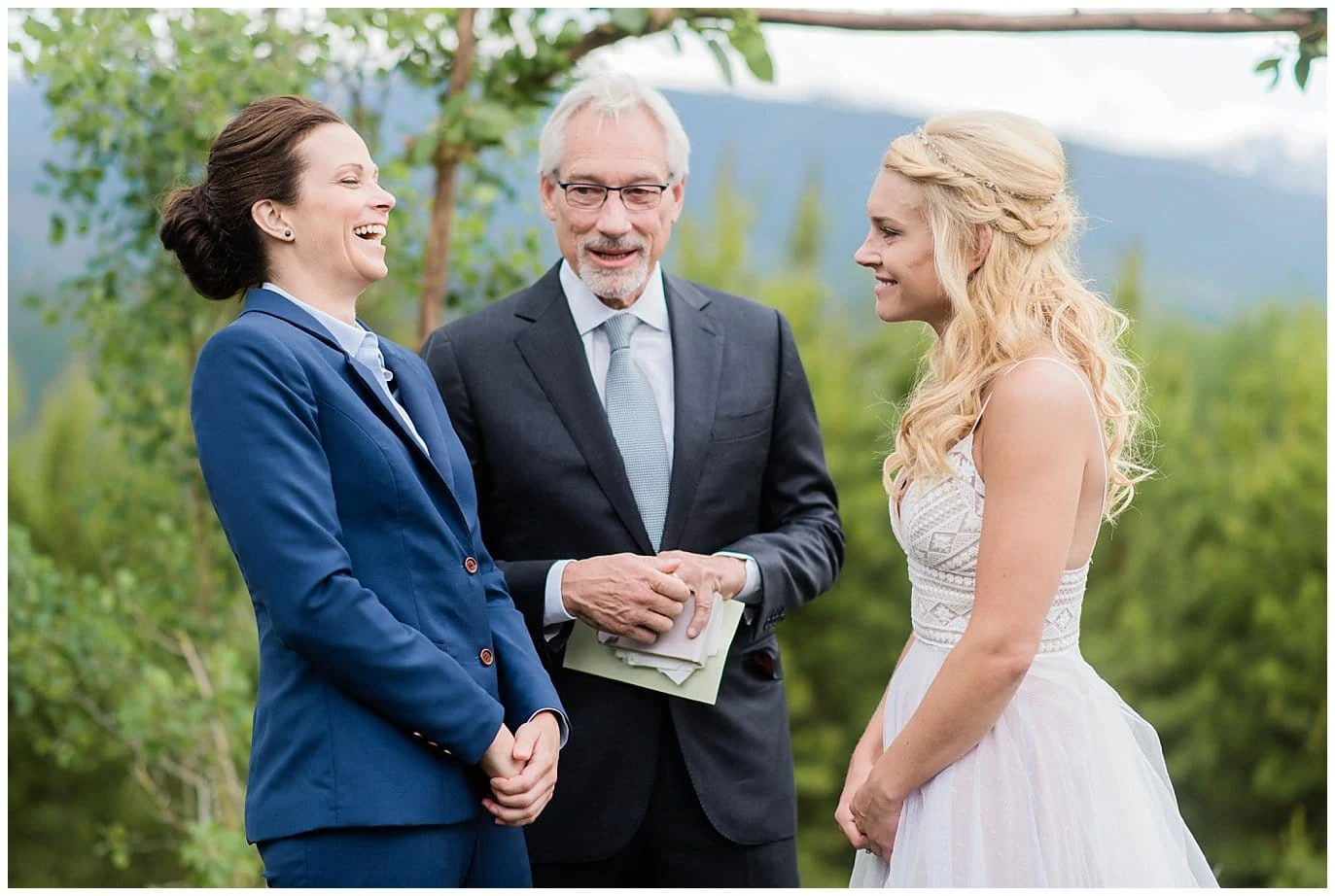 laughing at Colorado Winter Park wedding photo