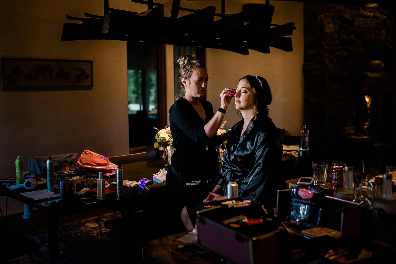bride getting make up done at private house by Granby Wedding Photographer Jennie Crate