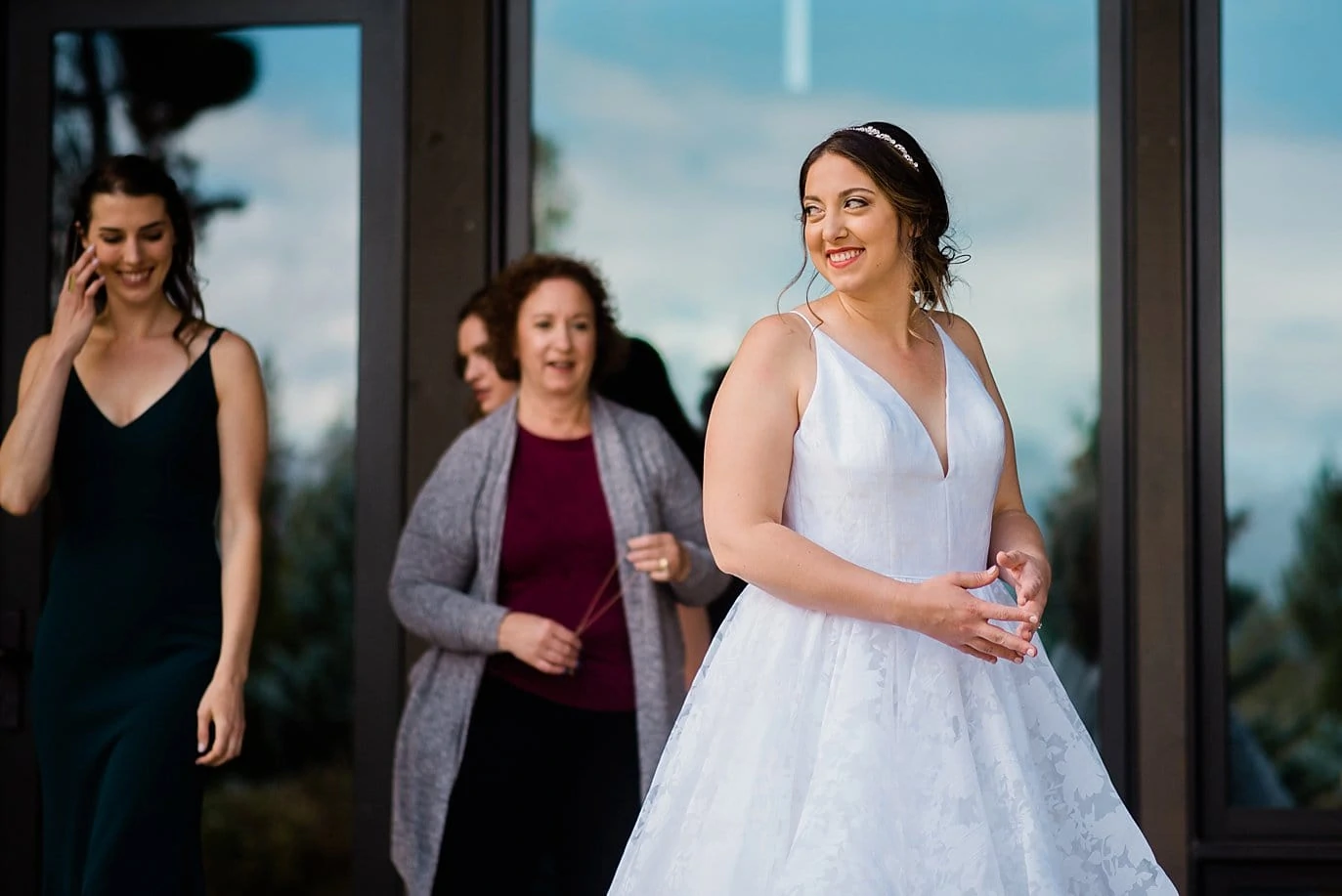 bride awaits first look on porch at VRBO by Fraser Wedding Photographer Jennie Crate