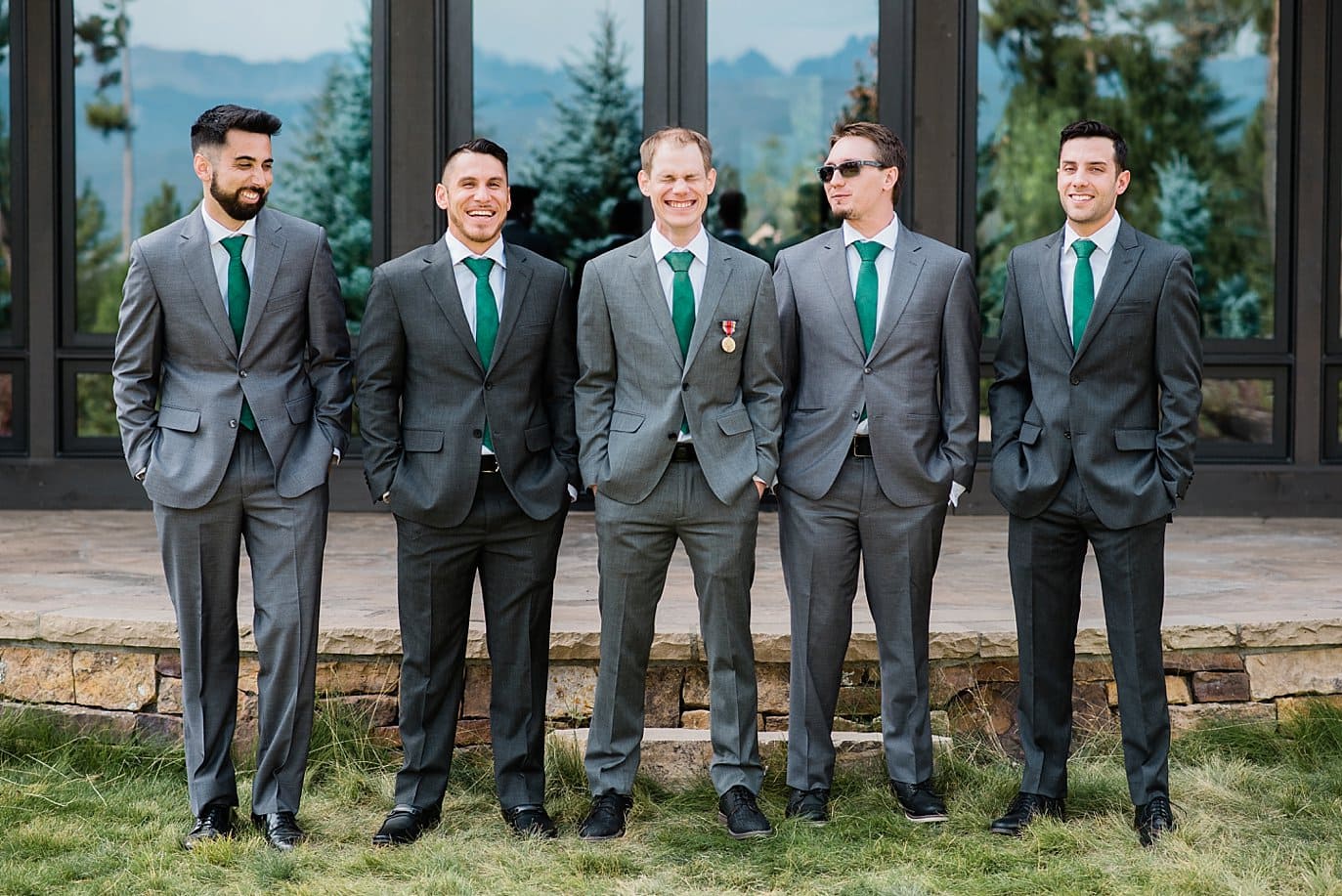 groomsmen in grey suites with custom forest green map ties at B Lazy 2 Ranch wedding by Tabernash wedding photographer Jennie Crate
