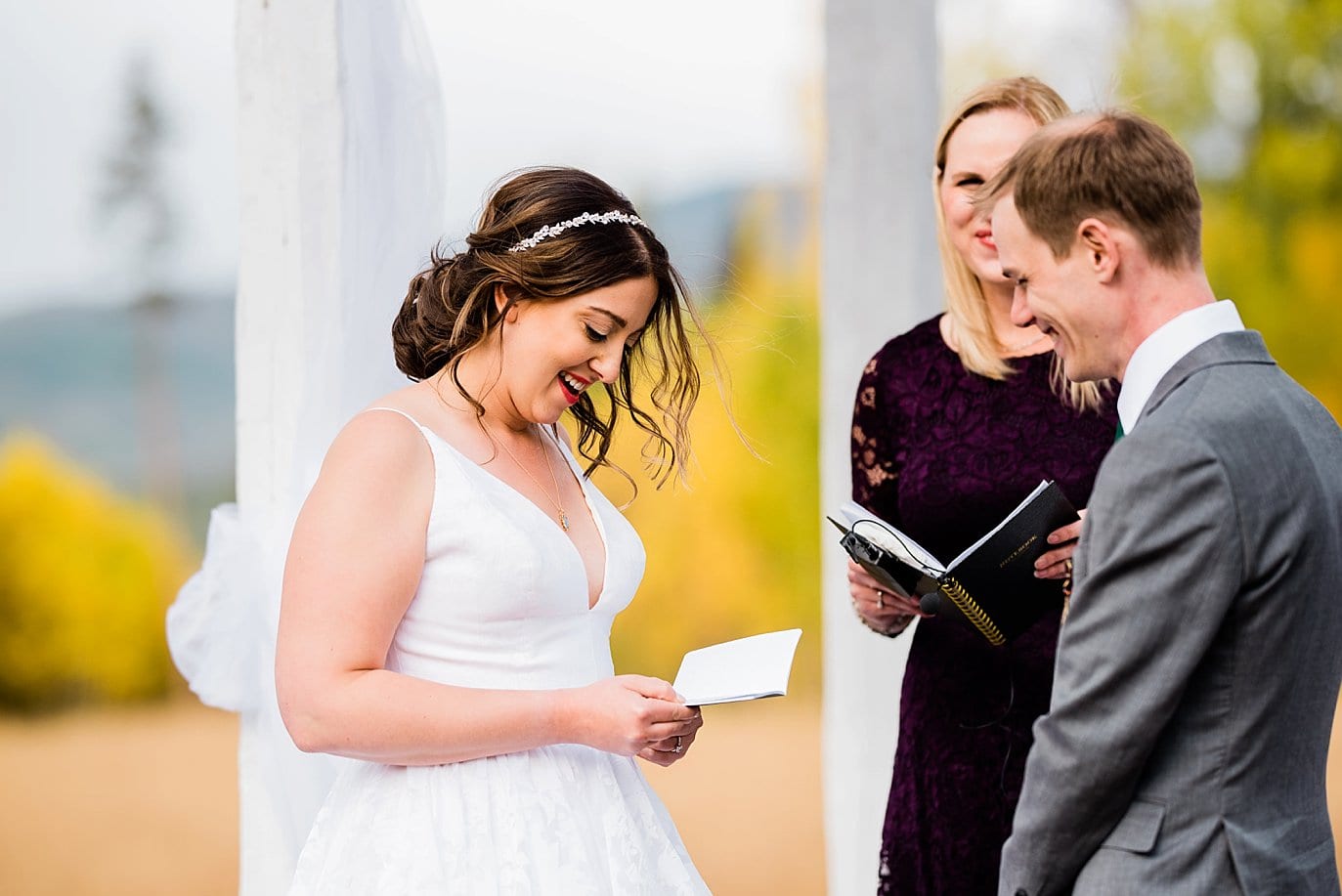 bride reads vows at B Lazy 2 Ranch wedding by Fraser wedding photographer Jennie Crate