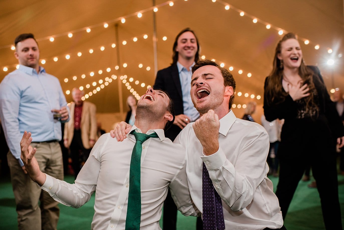 groomsmen dancing at B Lazy 2 Ranch by Denver wedding photographer Jennie Crate