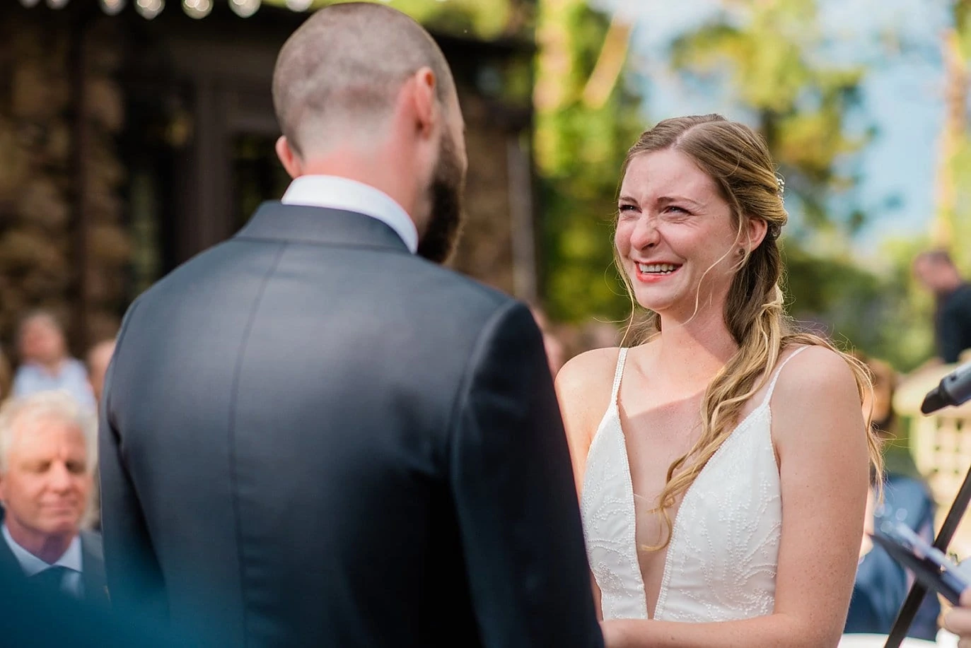 emotional vows during outdoor historic mansion wedding