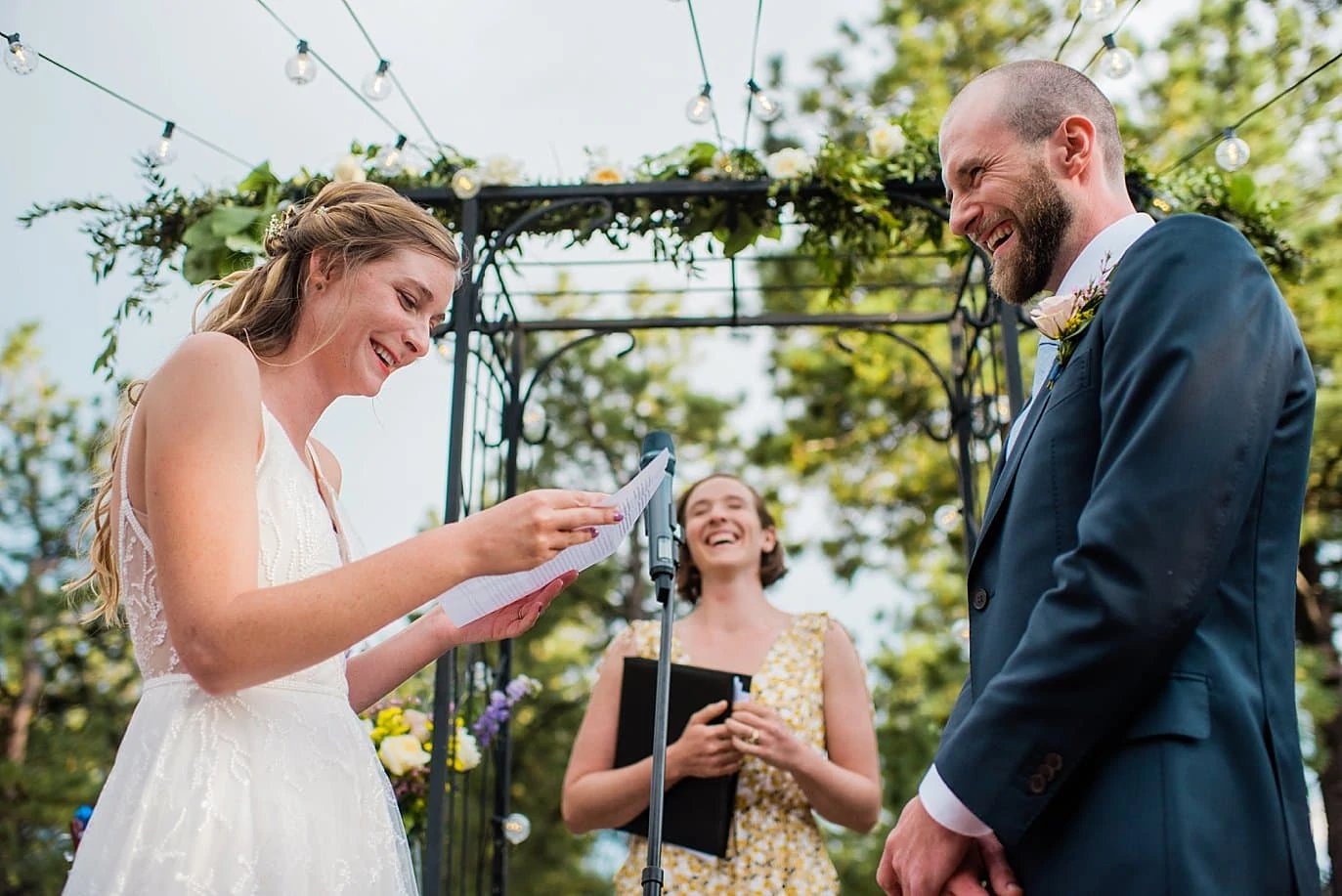 emotional vows on outdoor patio at romantic golden wedding by Evergreen Wedding photographer Jennie Crate