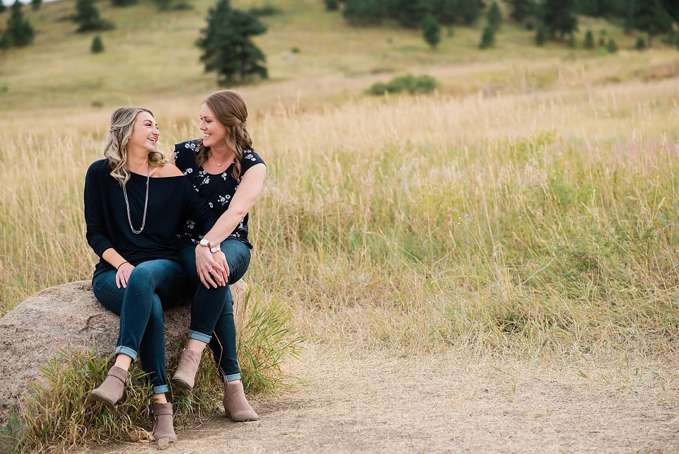 two women laughing at Chautaqua Park engagement by Denver engagement photographer Jennie Crate