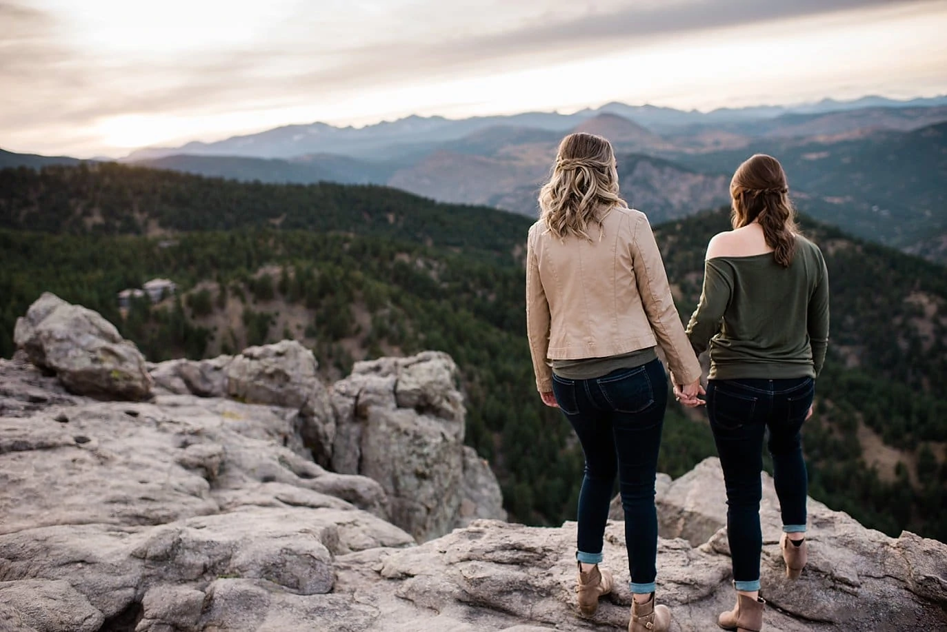 queer couple holding hands at top of Lost Gulch Lookout by Boulder wedding photographer Jennie Crate