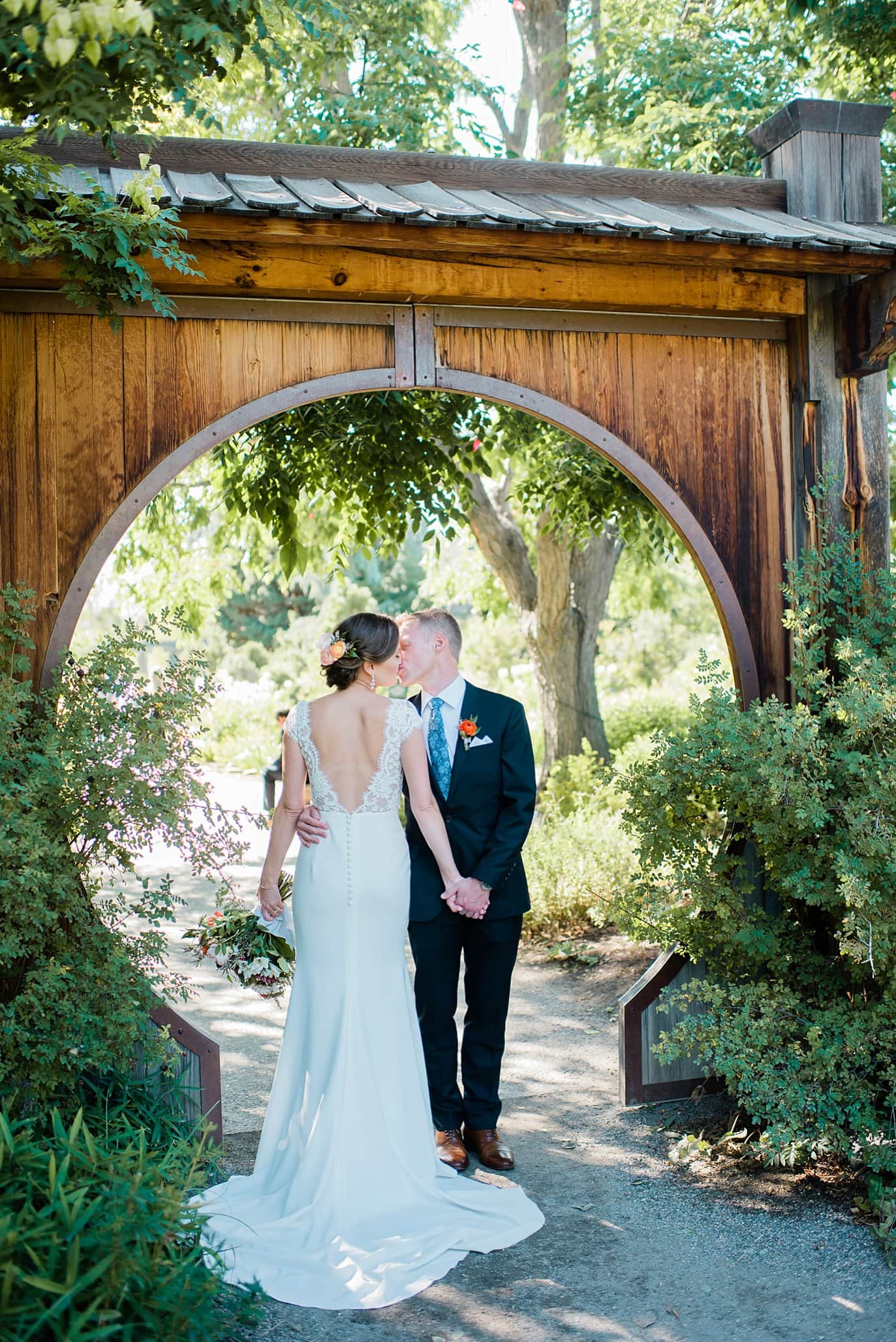 bride and groom in Asian garden at Denver Botanic Gardens Wedding by Boulder Wedding Photographer Jennie Crate