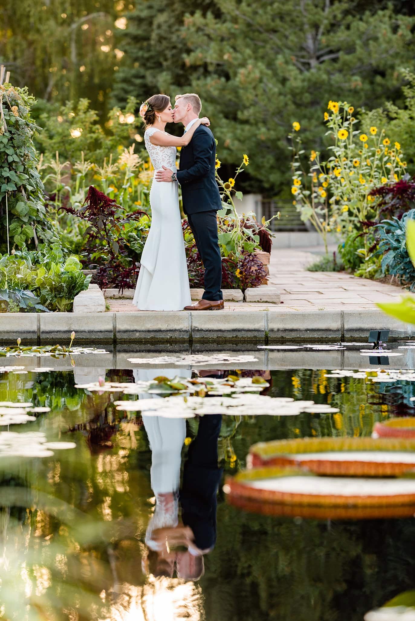 bride and groom sunset photo at Denver Botanic Gardens wedding by Boulder Wedding Photographer Jennie Crate