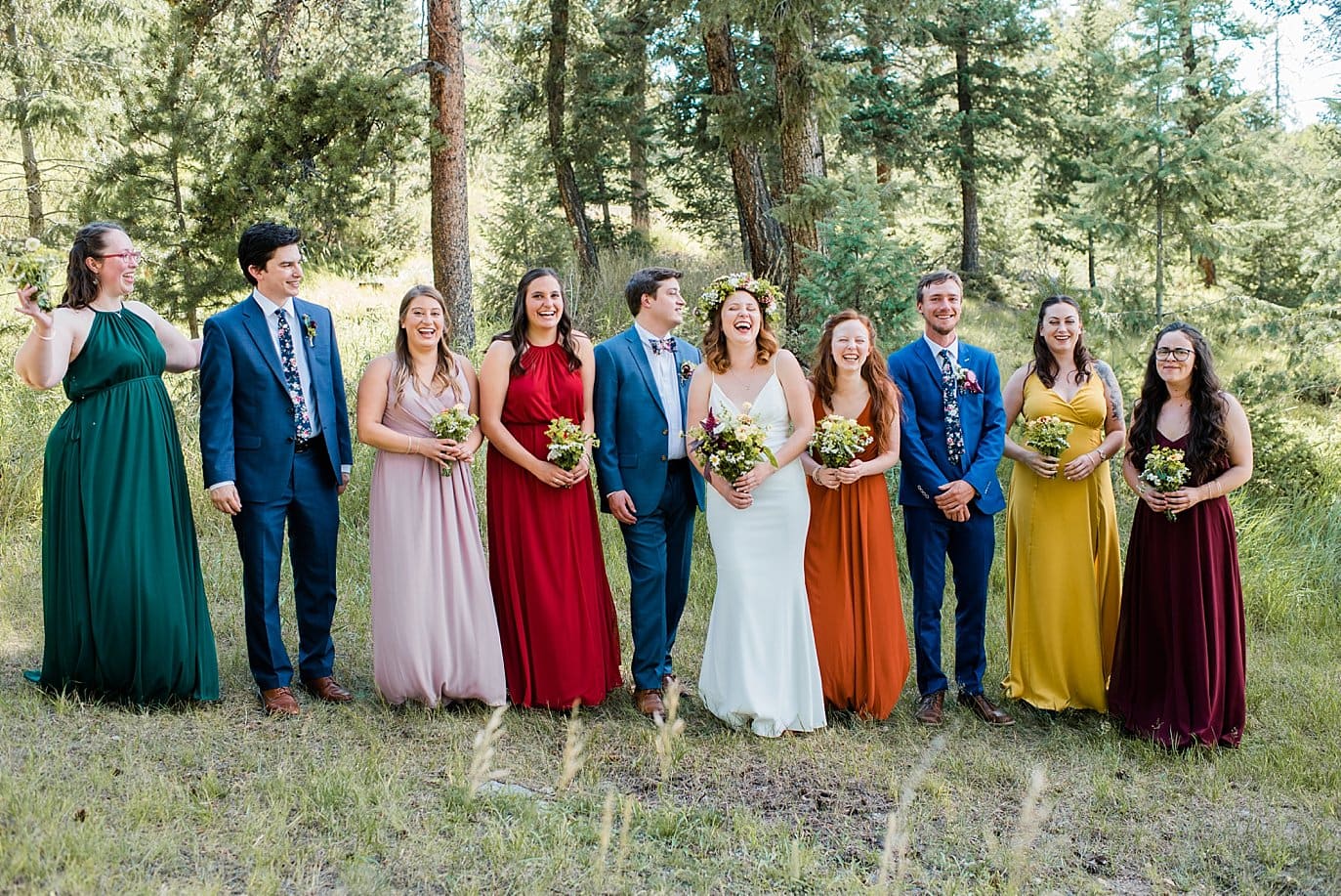 jewel toned bridesmaids dresses at Evergreen Red Barn wedding by Evergreen wedding photographer Jennie Crate
