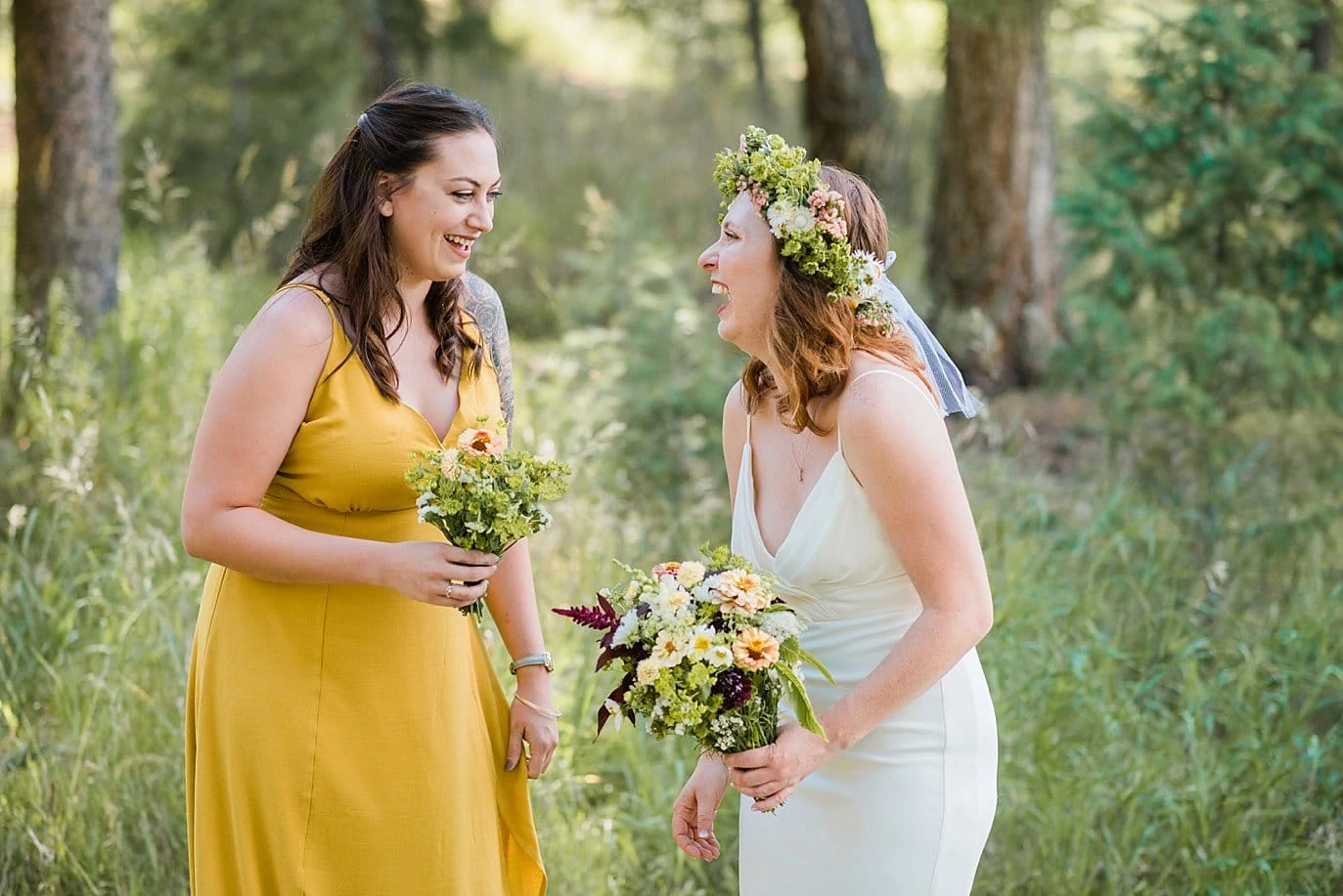 bride and bridesmaid in mustard yellow dress photo
