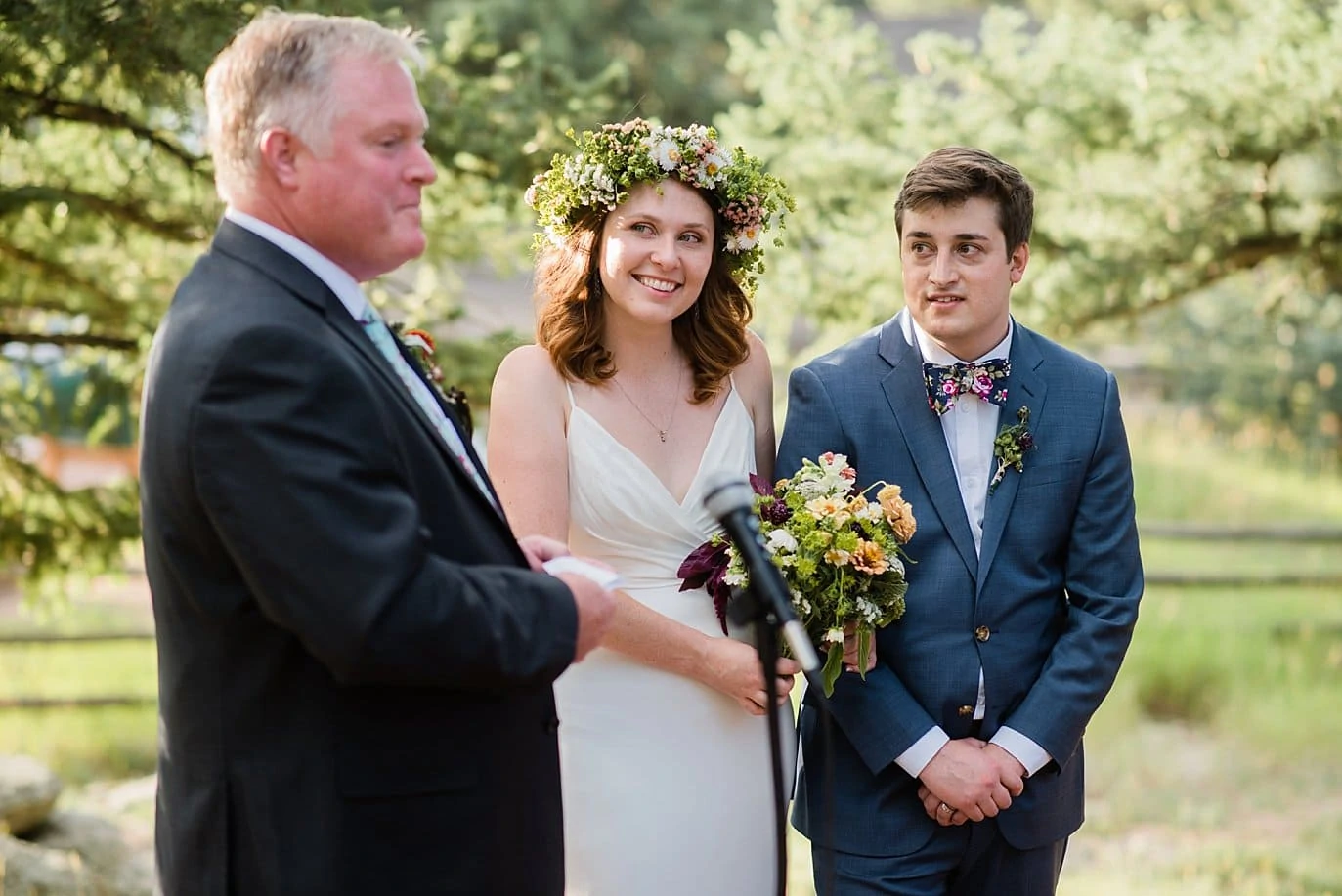 father of the bride toasts outdoor reception photo