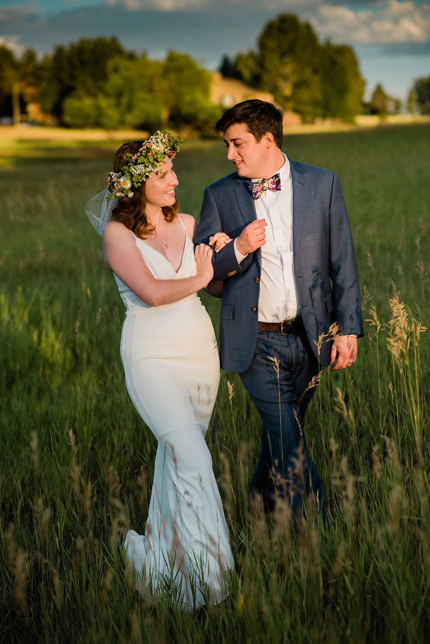 sunset walk in fields of Colorado wedding photo