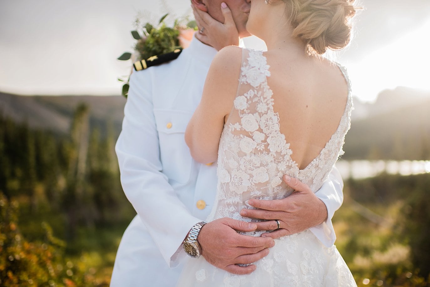 passionate kiss between bride and groom at sunset Indian Peaks Wilderness elopement