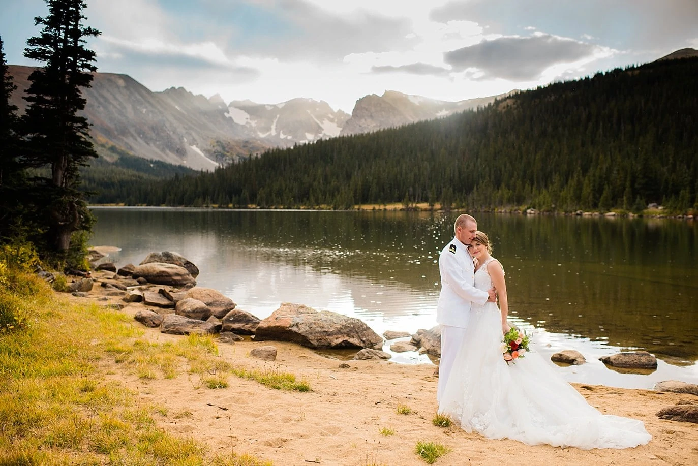romanic bride and groom by Colorado lake by Denver Wedding Photographer Jennie Crate Photographer