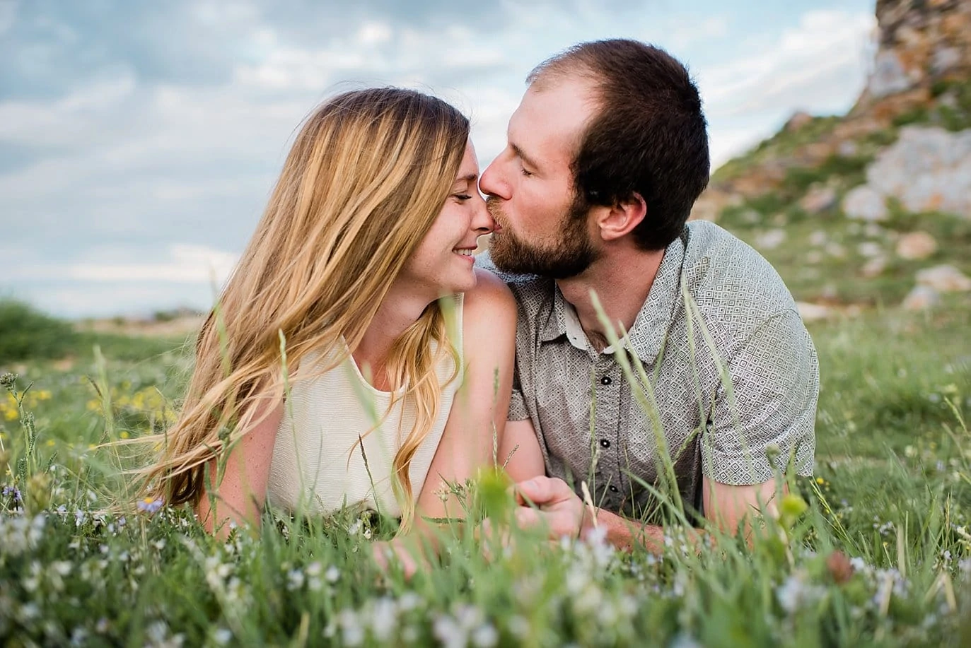 cute nose kiss during engagement session photo