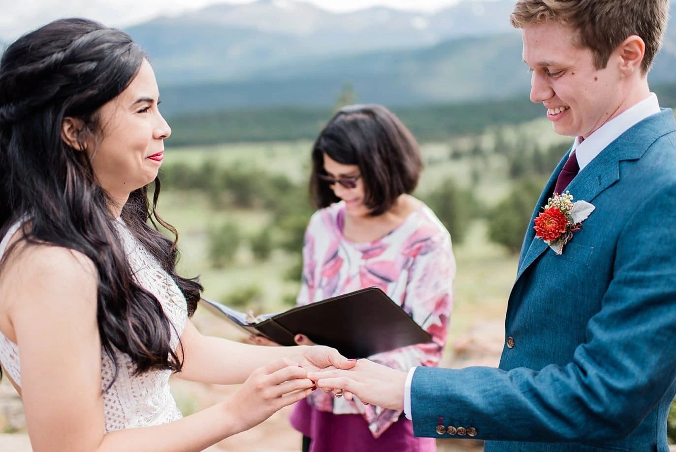 ring exchange at Rocky Mountain National Park Wedding by Estes Park Wedding Photography Jennie Crate 
