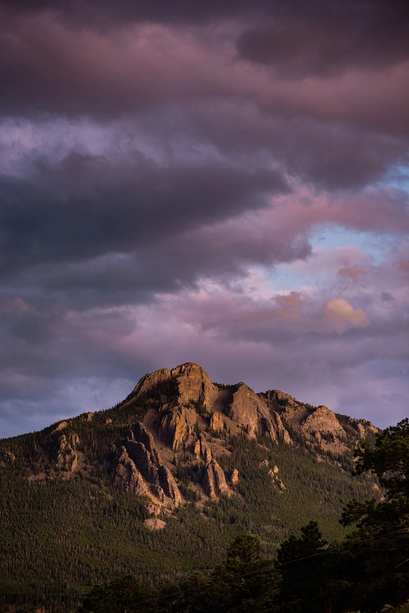 sunset with purple skies at Rocky Mountain Estes Park wedding by Estes Park Wedding Photography Jennie Crate 